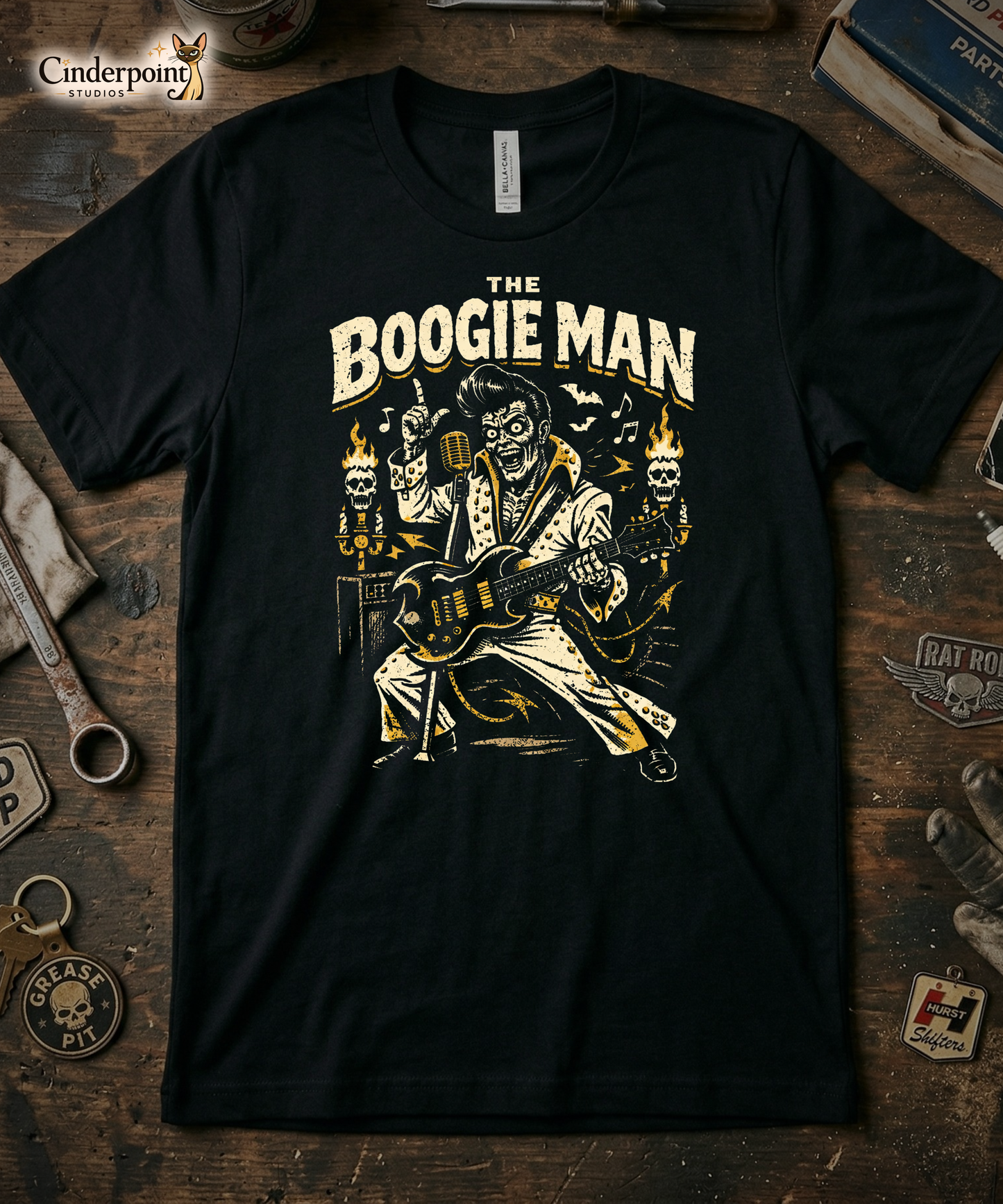 Black t-shirt with 'The Boogie Man' graphic design on a wooden surface.