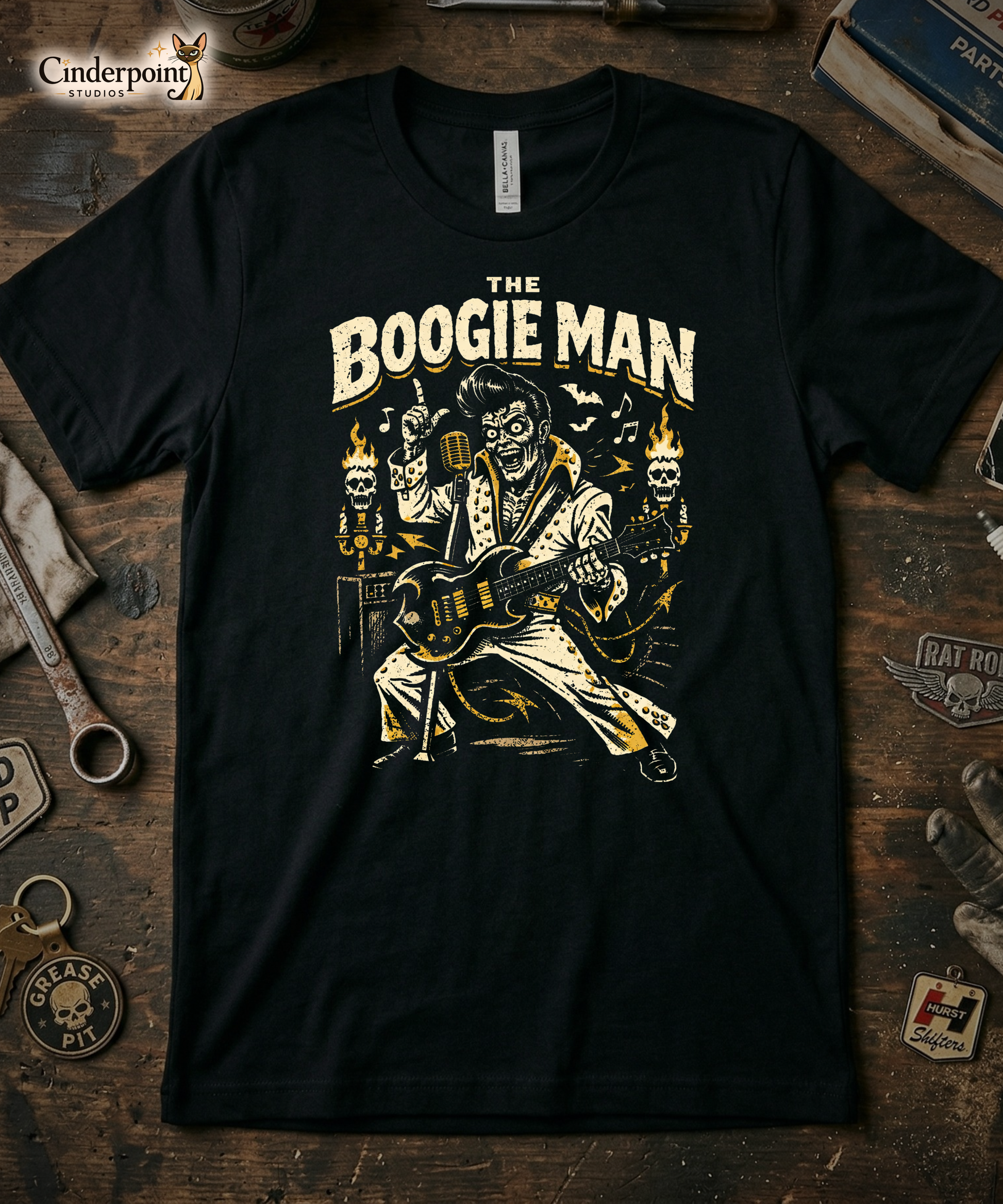Black t-shirt with 'The Boogie Man' graphic design on a wooden surface.
