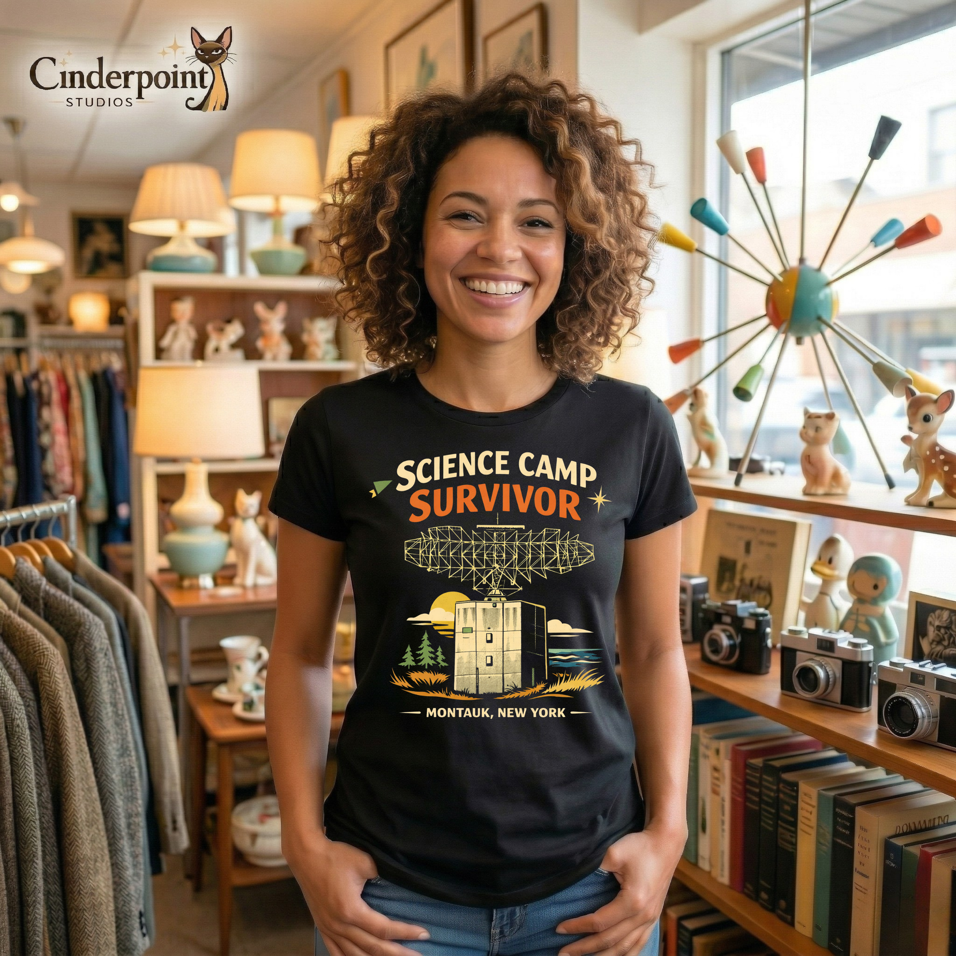 Black retro graphic t-shirt featuring the phrase Science Camp Survivor above a vintage-style radar tower illustration with Montauk, New York text below.
