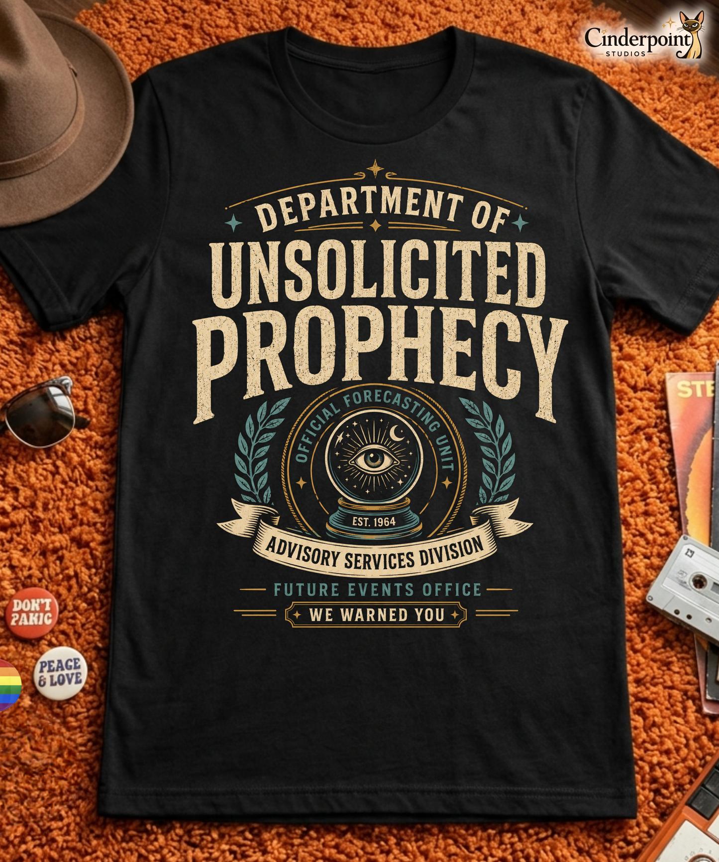 Department of Unsolicited Prophecy t-shirt design with vintage typography, crystal ball eye emblem, official forecasting unit text, and advisory services division banner