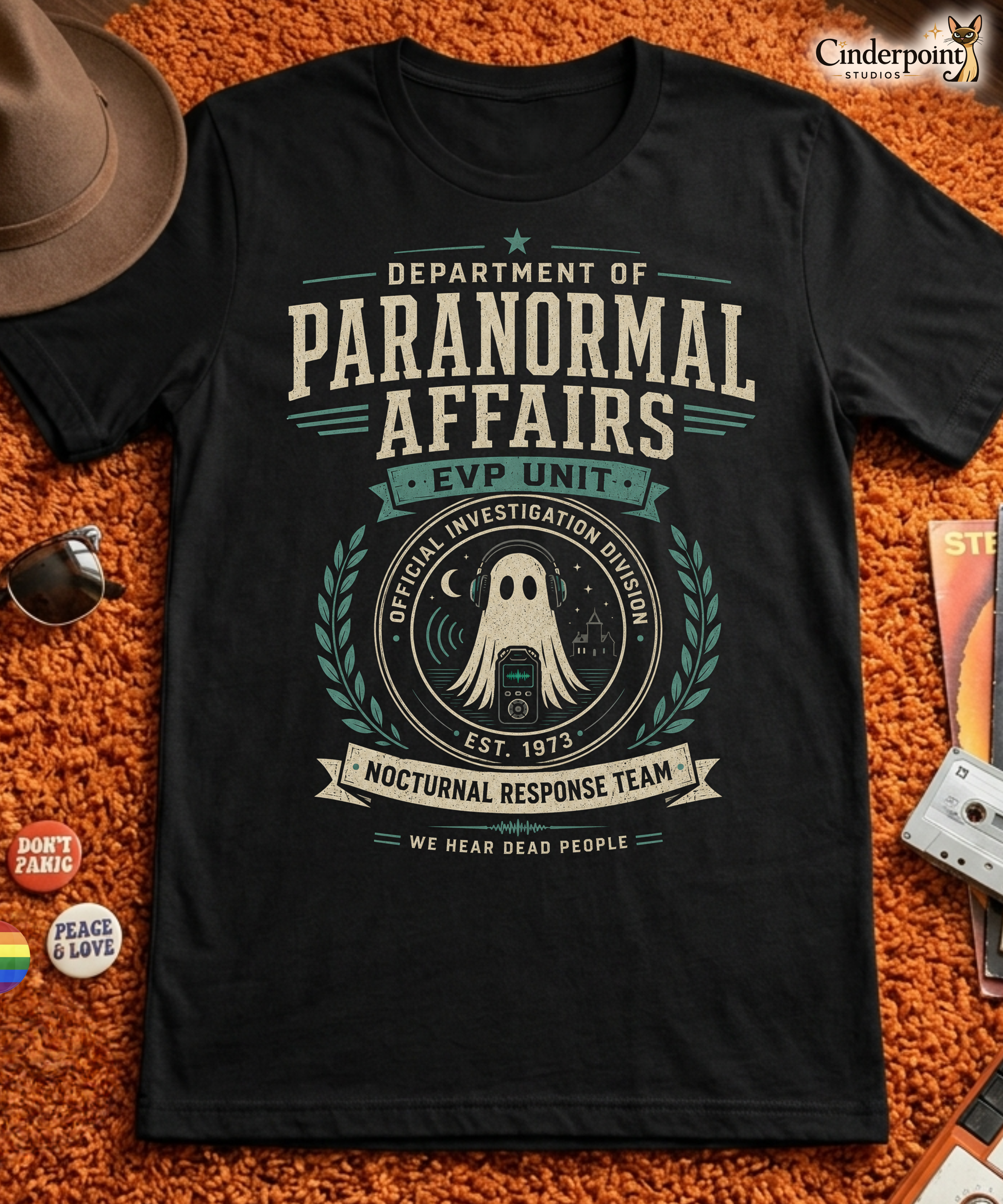 Department of Paranormal Affairs t-shirt design with EVP Unit banner, headphone ghost, audio recorder, haunted house, and nocturnal response team text