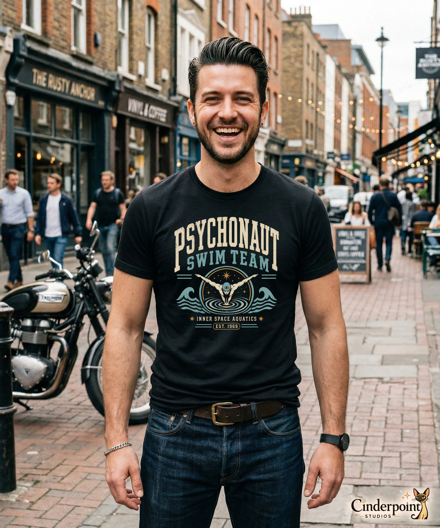 Man wearing black Psychonaut Swim Team t-shirt with retro psychedelic swim club artwork by Cinderpoint Studios