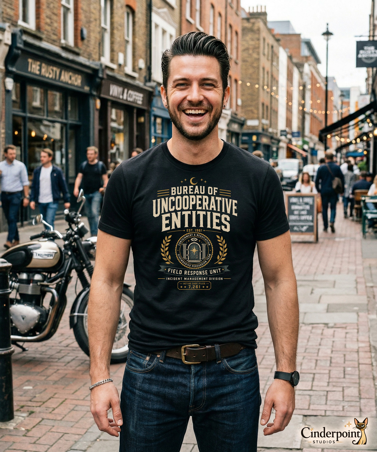 Male lifestyle mockup wearing black Bureau of Uncooperative Entities t-shirt with retro paranormal agency graphic by Cinderpoint Studios