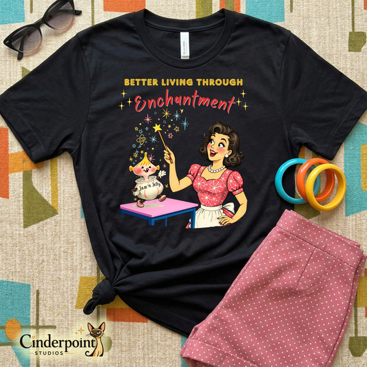 Overhead flat-lay of a black Better Living Through Enchantment t-shirt on a geometric retro rug with pink polka dot shorts and vintage bangles.