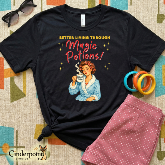 Retro watercolor illustration of a 1950s woman in a blue robe and hair curlers holding a steaming mug labeled "Wake Up Potion" on a black t-shirt.