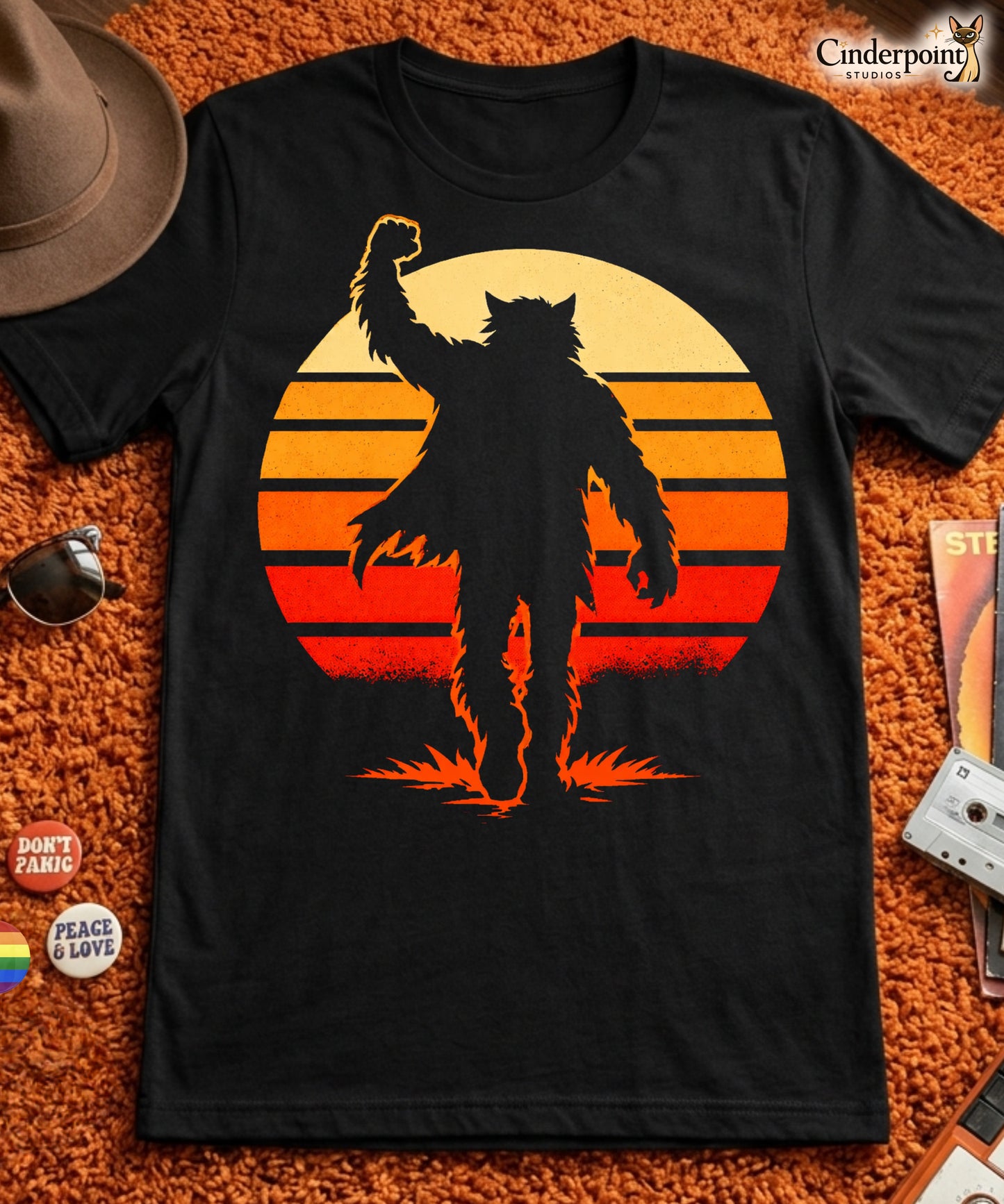 A retro-style graphic t-shirt featuring a werewolf version of Judd Nelson’s character from The Breakfast Club, raising a hairy fist in the air against a vibrant 80s sunburst.