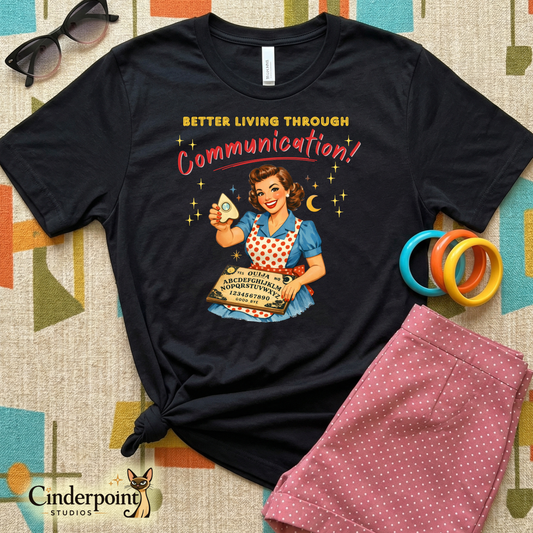 Black t-shirt with vintage-style graphic and text on a patterned surface, featuring 'Cinderpoint Studios' logo.