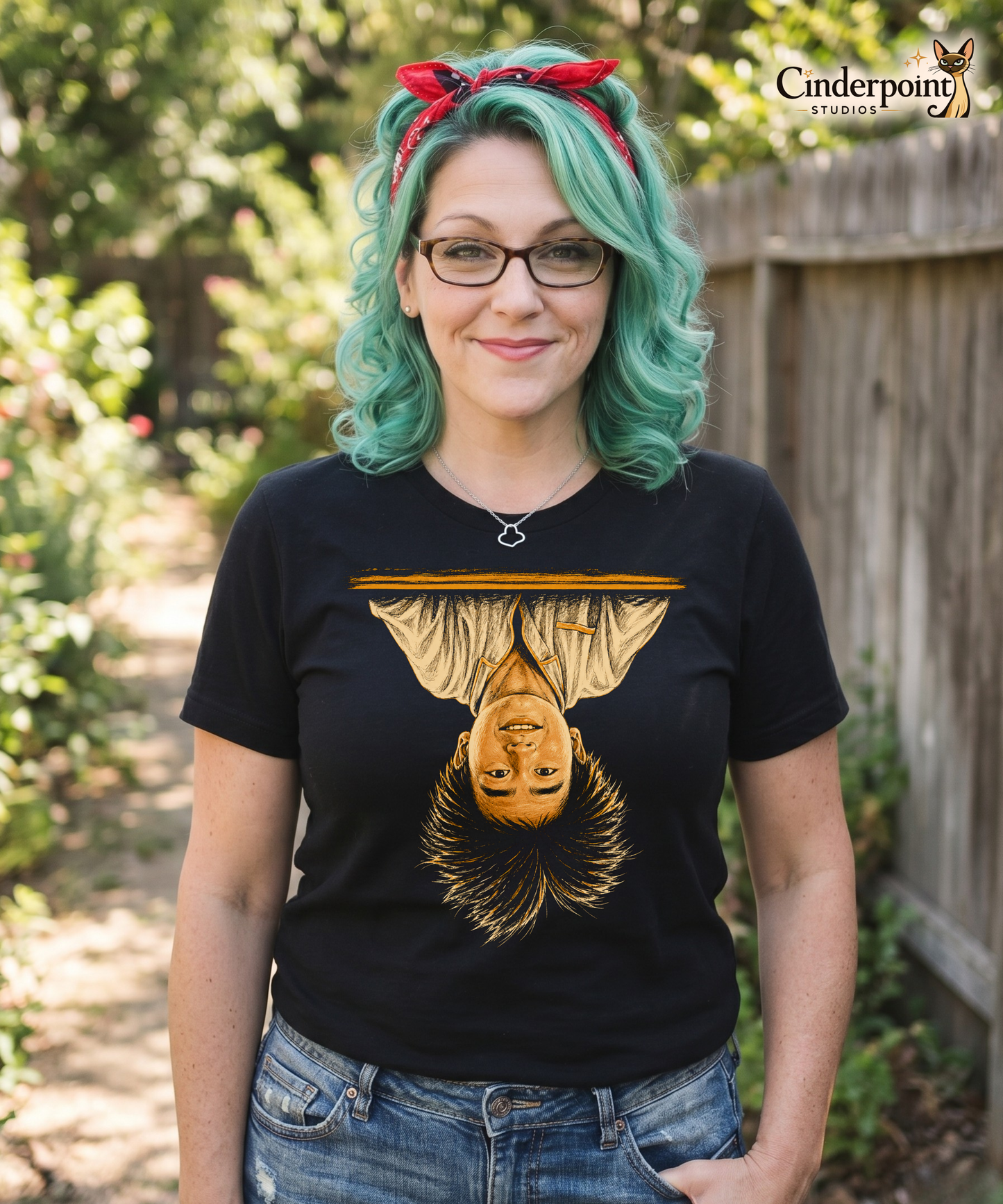 Mel wearing A black t-shirt featuring the iconic image of Long Duk Dong upside down from the scene "What's Happenin Hot Stuff" in the 80s comedy Sixteen Candles.