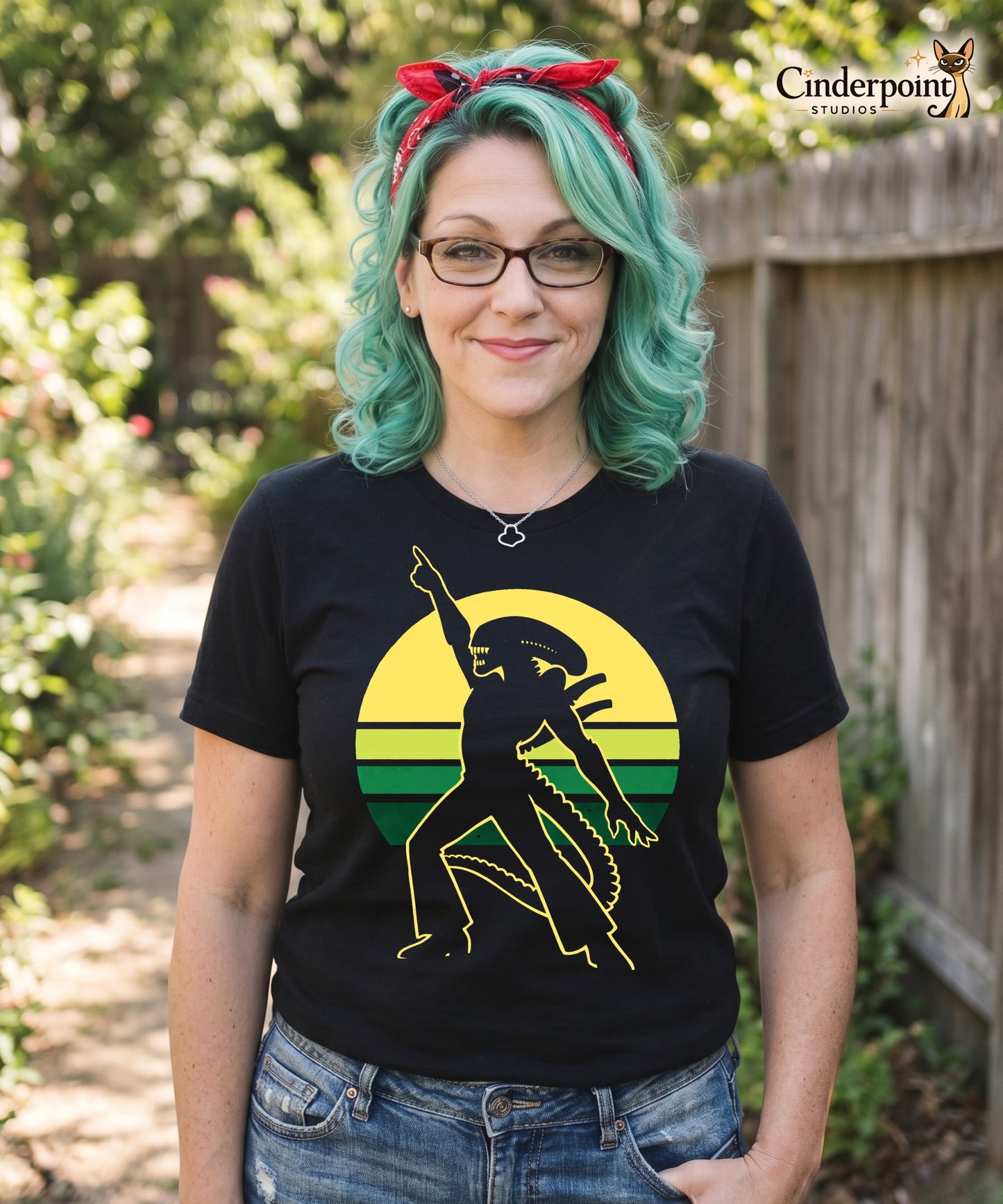 Lifestyle shot of A retro-style graphic t-shirt featuring a Xenomorph alien in the iconic Saturday Night Fever disco pose against a vibrant 1970s sunburst background.