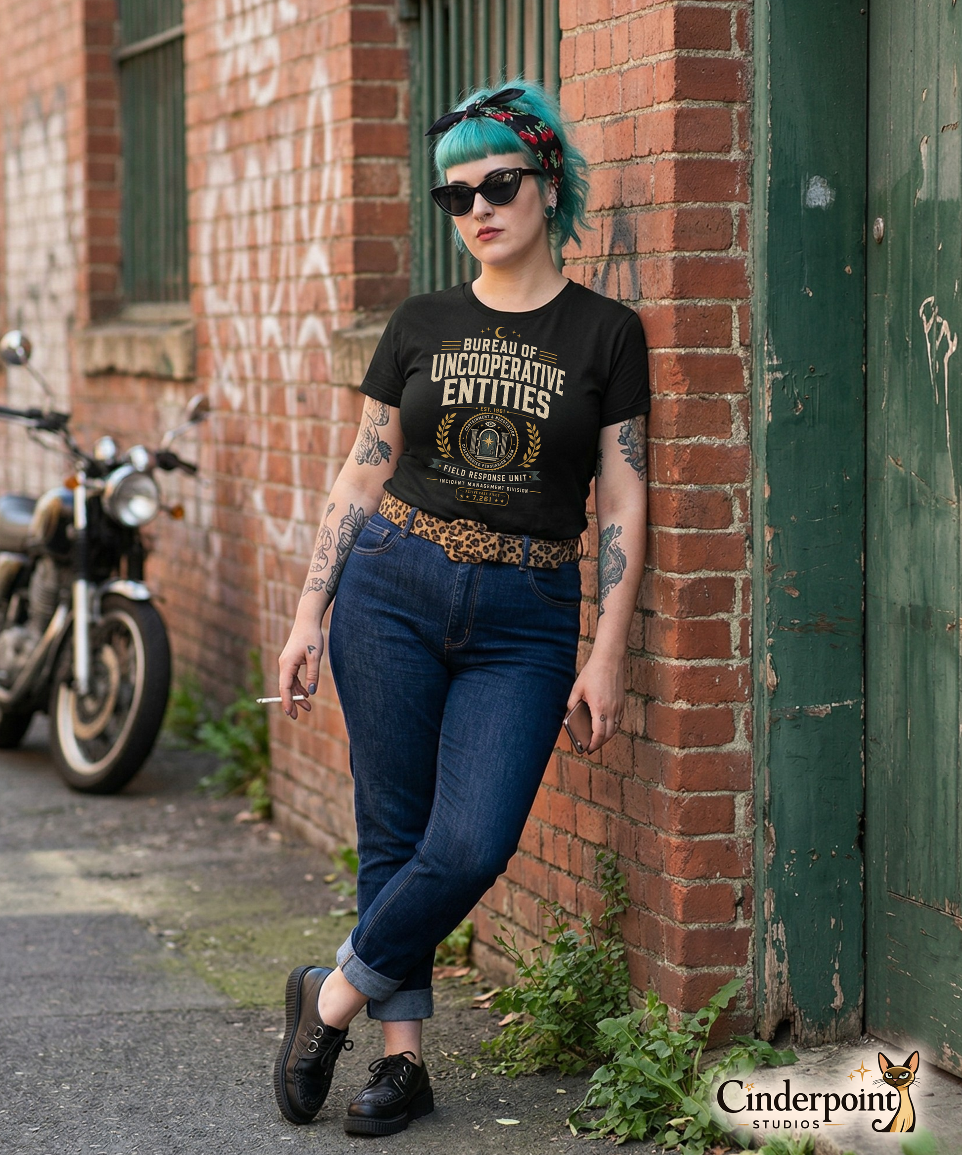 Female lifestyle mockup wearing black Bureau of Uncooperative Entities t-shirt with occult field unit design