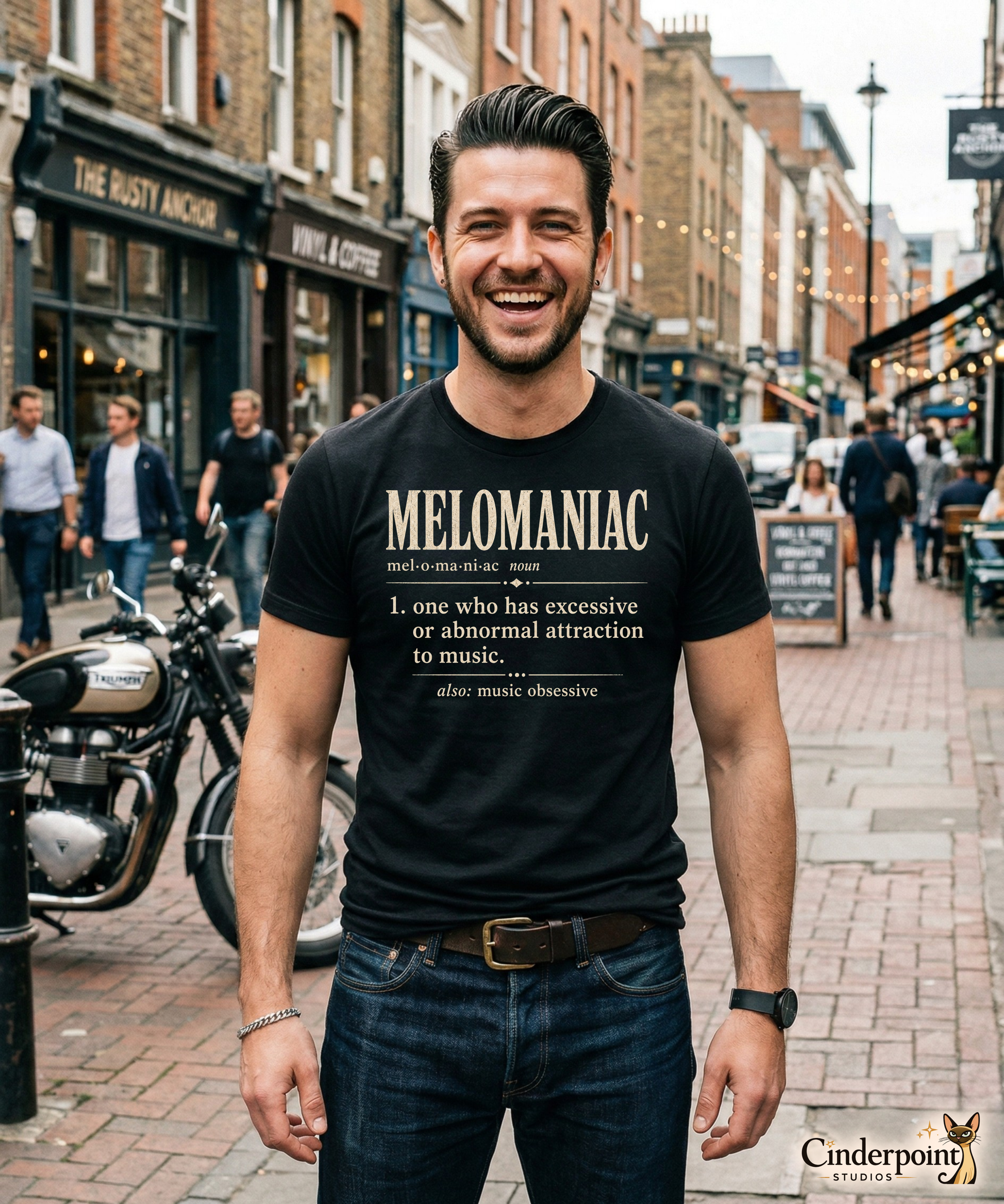 Model wearing black Melomaniac music lover t-shirt with vintage dictionary definition graphic