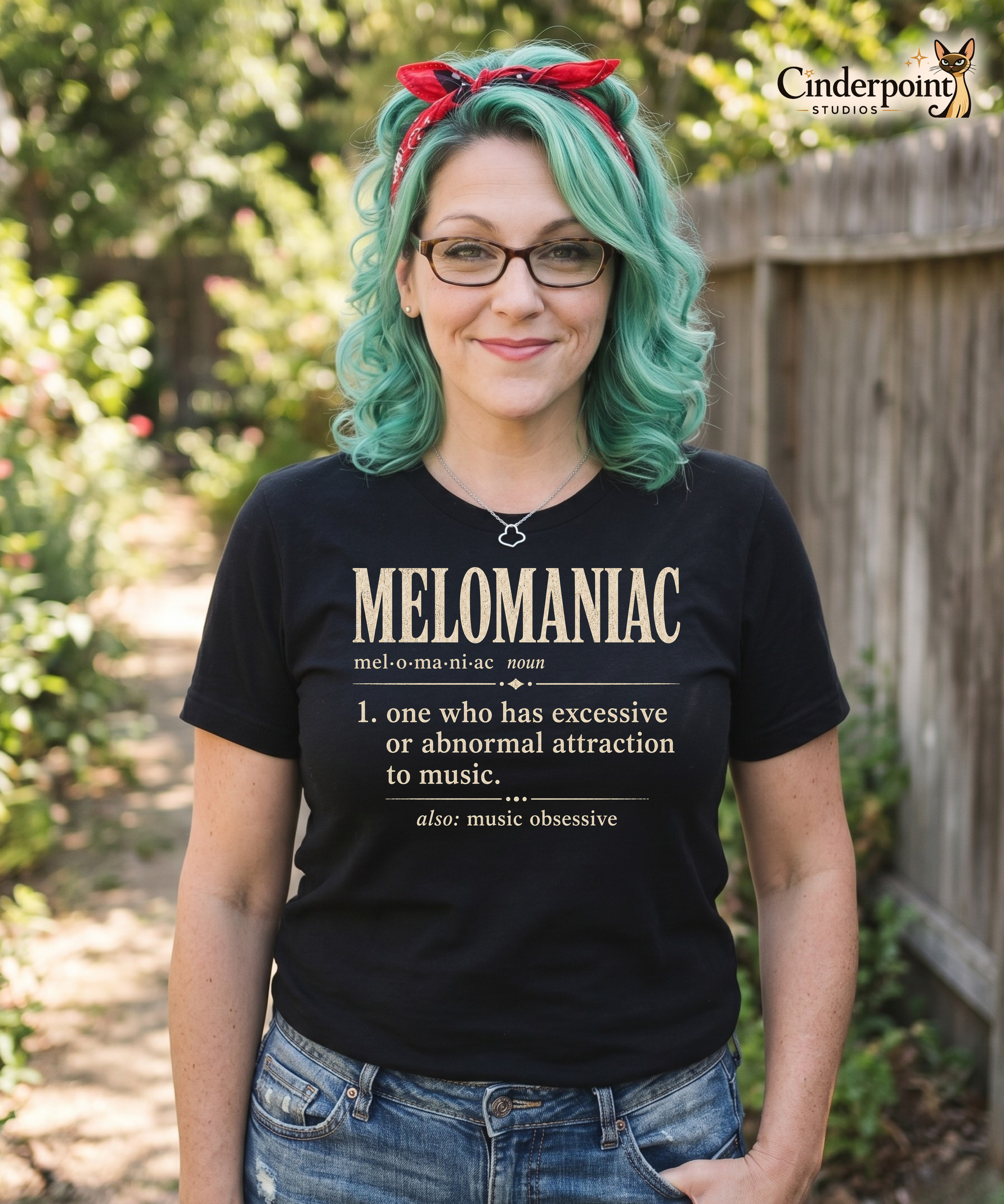 Model wearing black Melomaniac music lover t-shirt with vintage dictionary definition graphic