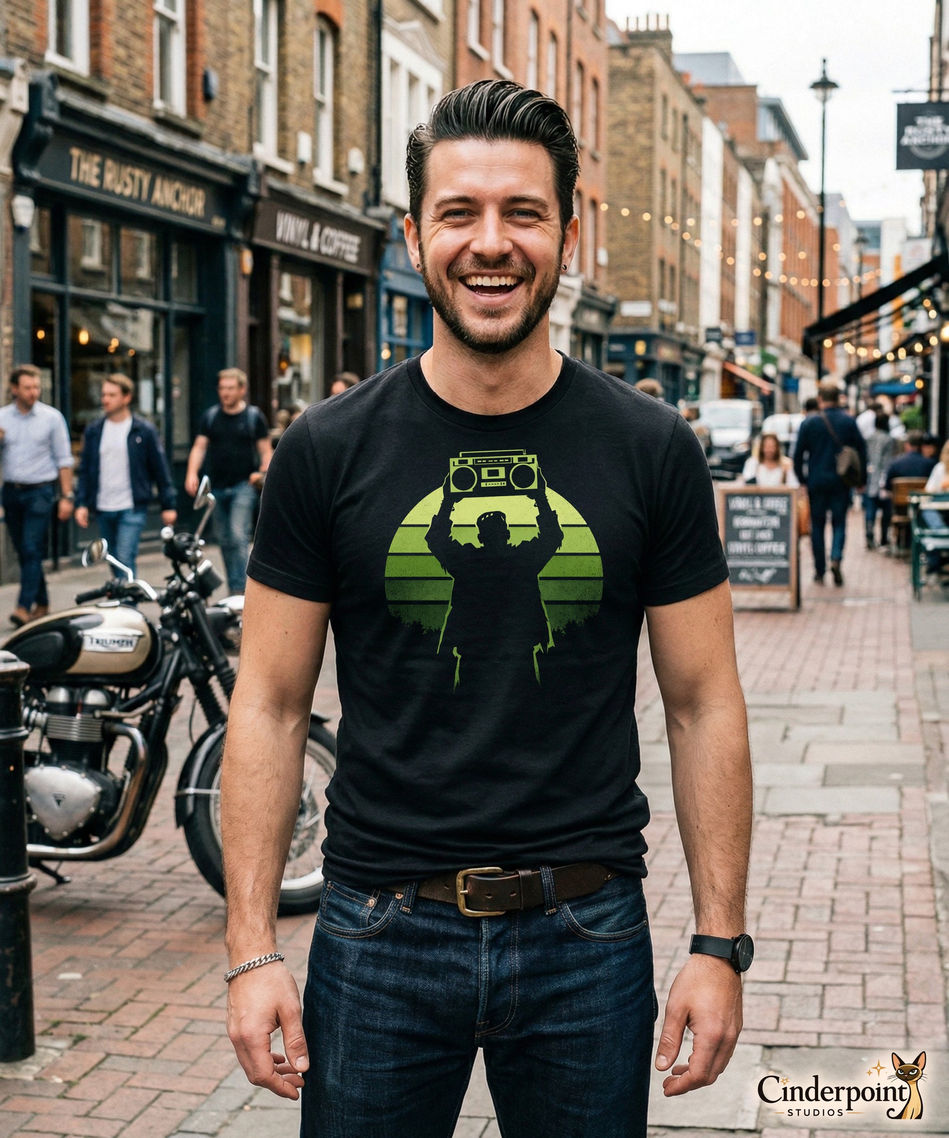 A retro-style graphic t-shirt featuring Frankenstein’s monster holding a 1980s boombox over his head in the iconic Say Anything movie pose, set against a vibrant neon sunburst.