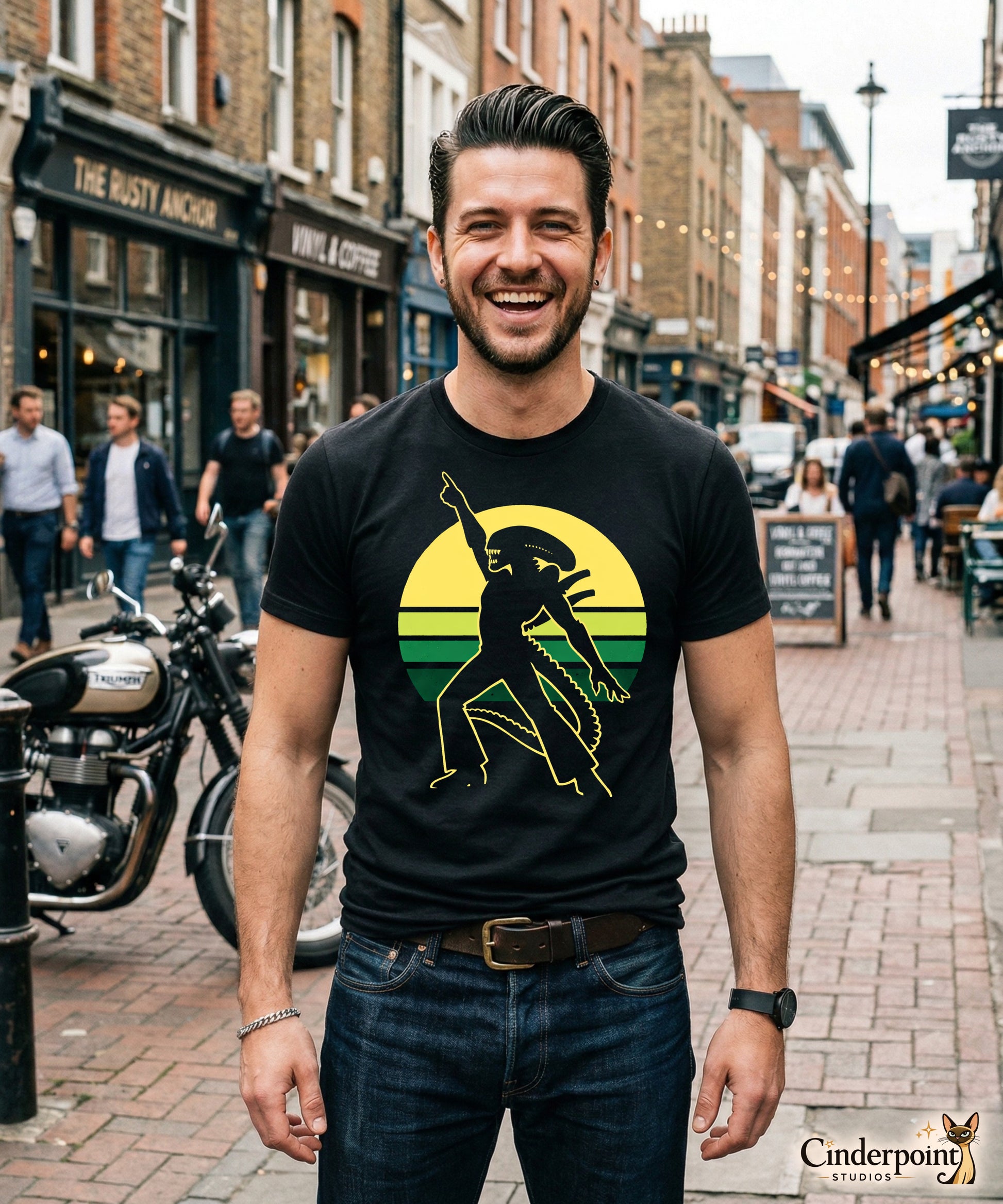 Man wearing a black t-shirt with a disco dancing alien graphic design on a city street.