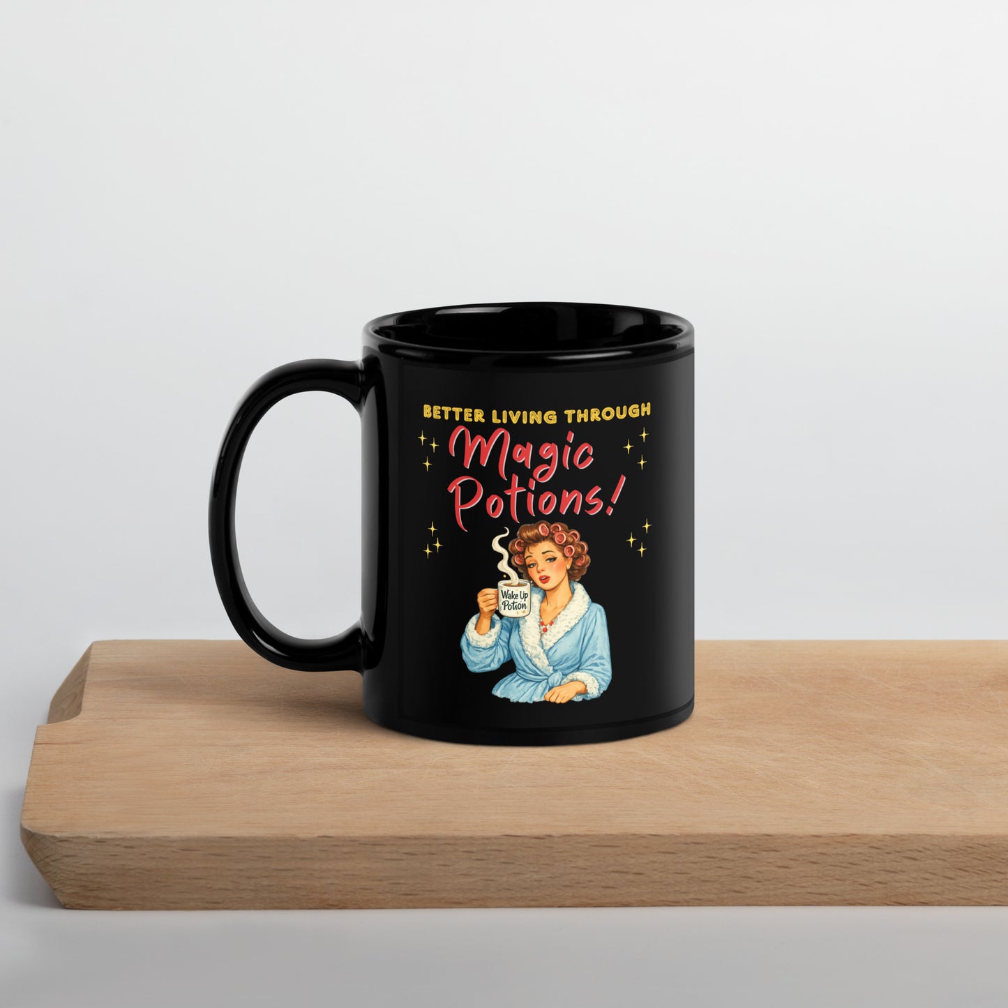 Better Living Through Magic Potions black ceramic mug — vintage retro housewife in pink rollers and blue fluffy robe holding a steaming Wake Up Potion mug, printed on both sides by Cinderpoint Studios