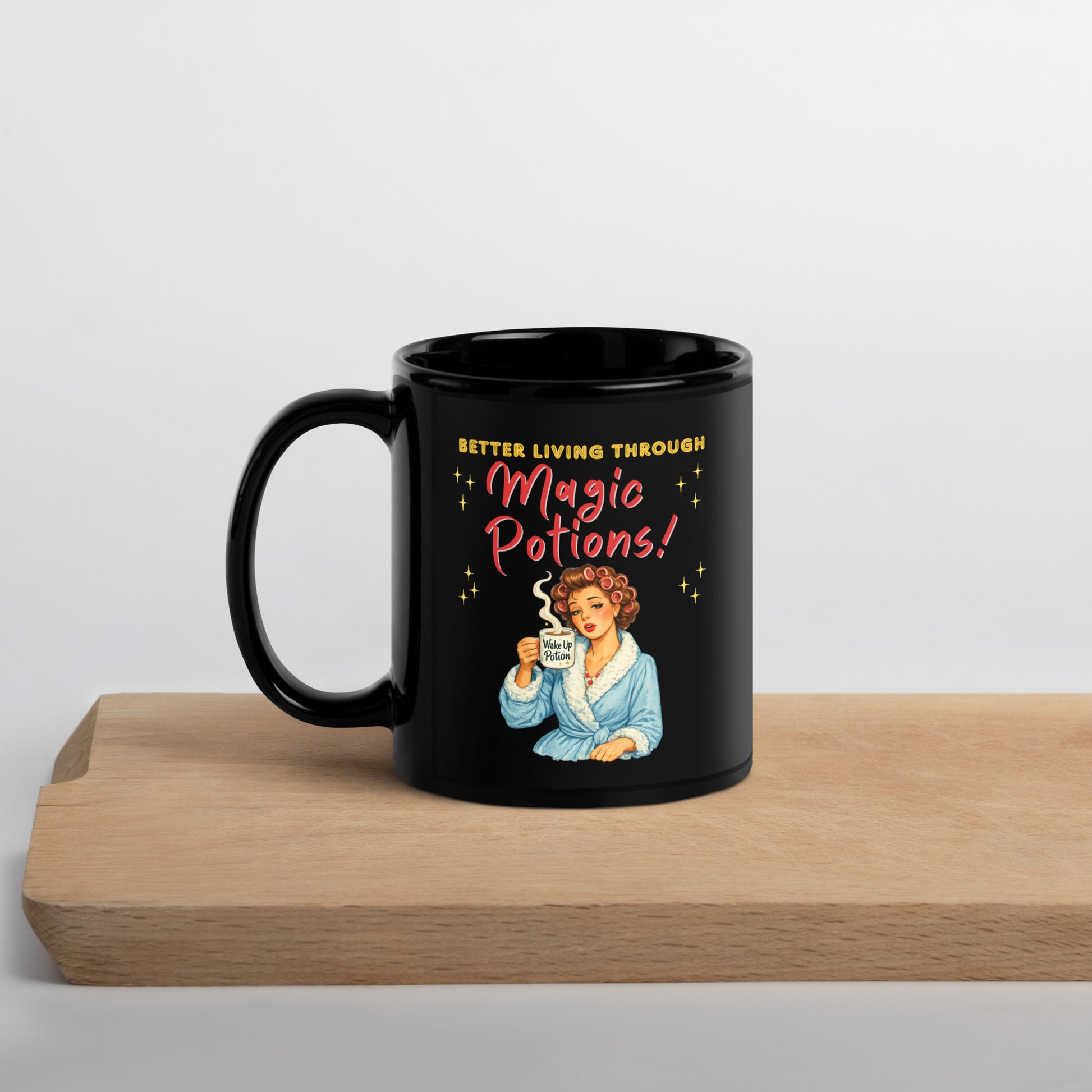 Better Living Through Magic Potions black ceramic mug — vintage retro housewife in pink rollers and blue fluffy robe holding a steaming Wake Up Potion mug, printed on both sides by Cinderpoint Studios