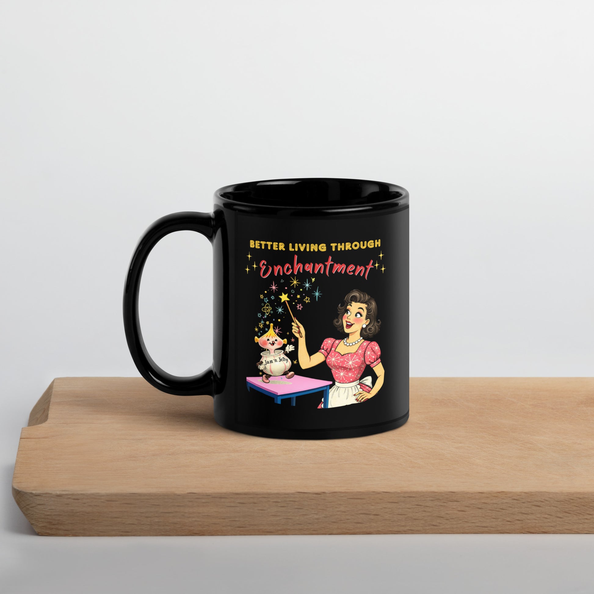 Better Living Through Enchantment black ceramic mug — vintage 1950s retro housewife in atomic snowflake dress pointing a magic wand at an enchanted anthropomorphic Jam n Jelly jar dancing on a pink table, printed on both sides by Cinderpoint Studios