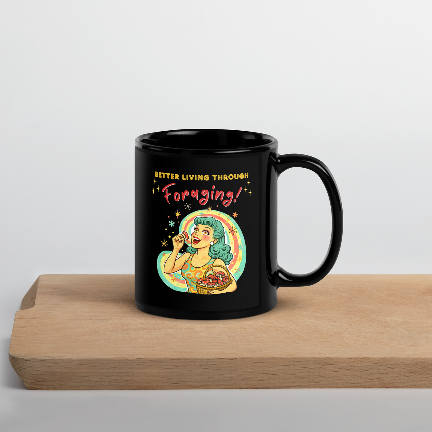 Better Living Through Foraging black ceramic mug — vintage retro housewife with teal hair and glowing eyes holding a red mushroom with basket of foraged mushrooms against rainbow halo, printed on both sides by Cinderpoint Studios