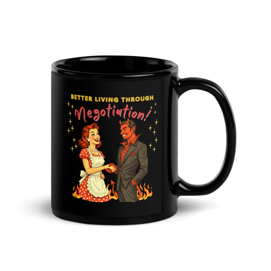 Better Living Through Negotiation black ceramic mug — vintage 1950s retro housewife in polka dot apron confidently shaking hands with a suited Devil amid flames, printed on both sides by Cinderpoint Studios