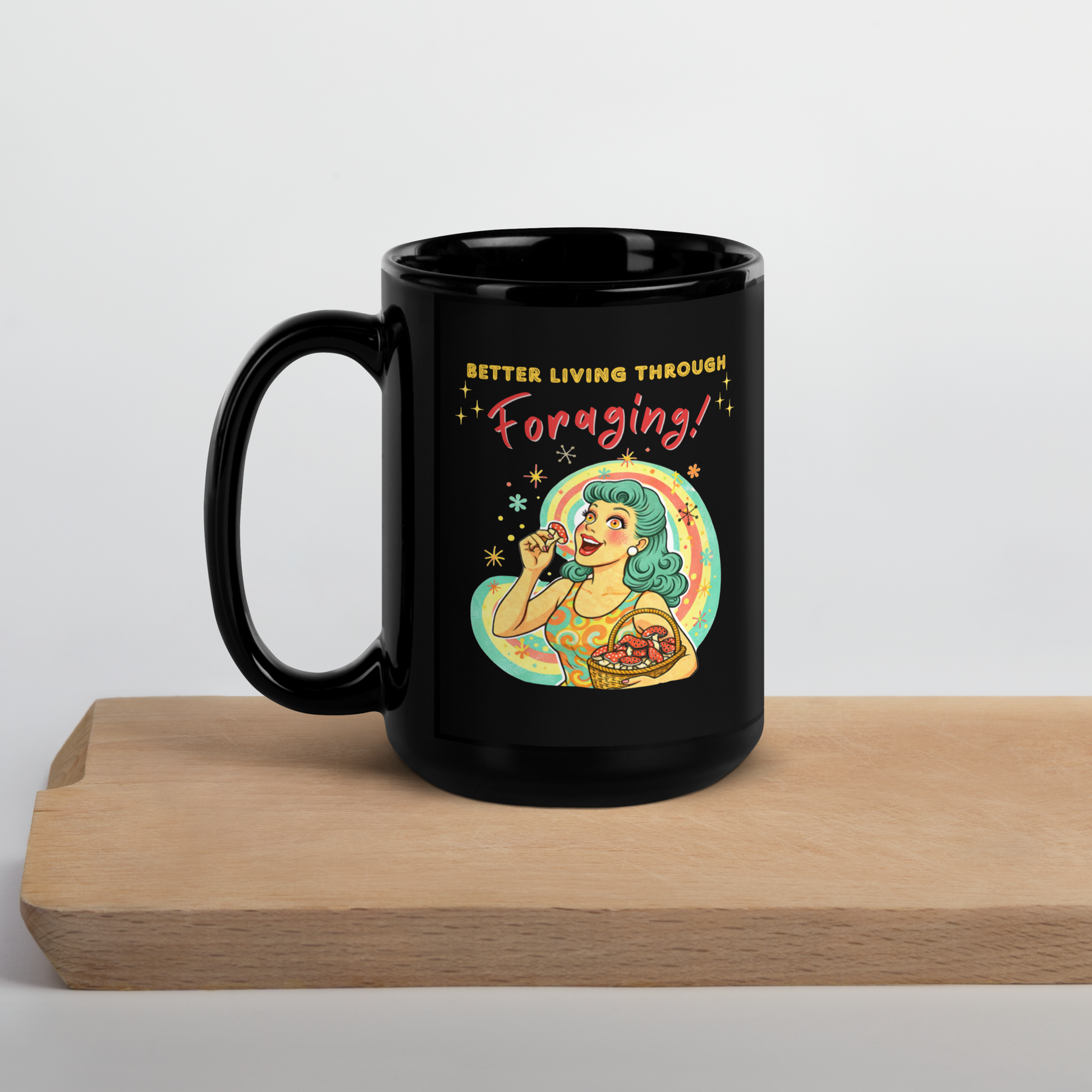 Better Living Through Foraging black ceramic mug — vintage retro housewife with teal hair and glowing eyes holding a red mushroom with basket of foraged mushrooms against rainbow halo, printed on both sides by Cinderpoint Studios