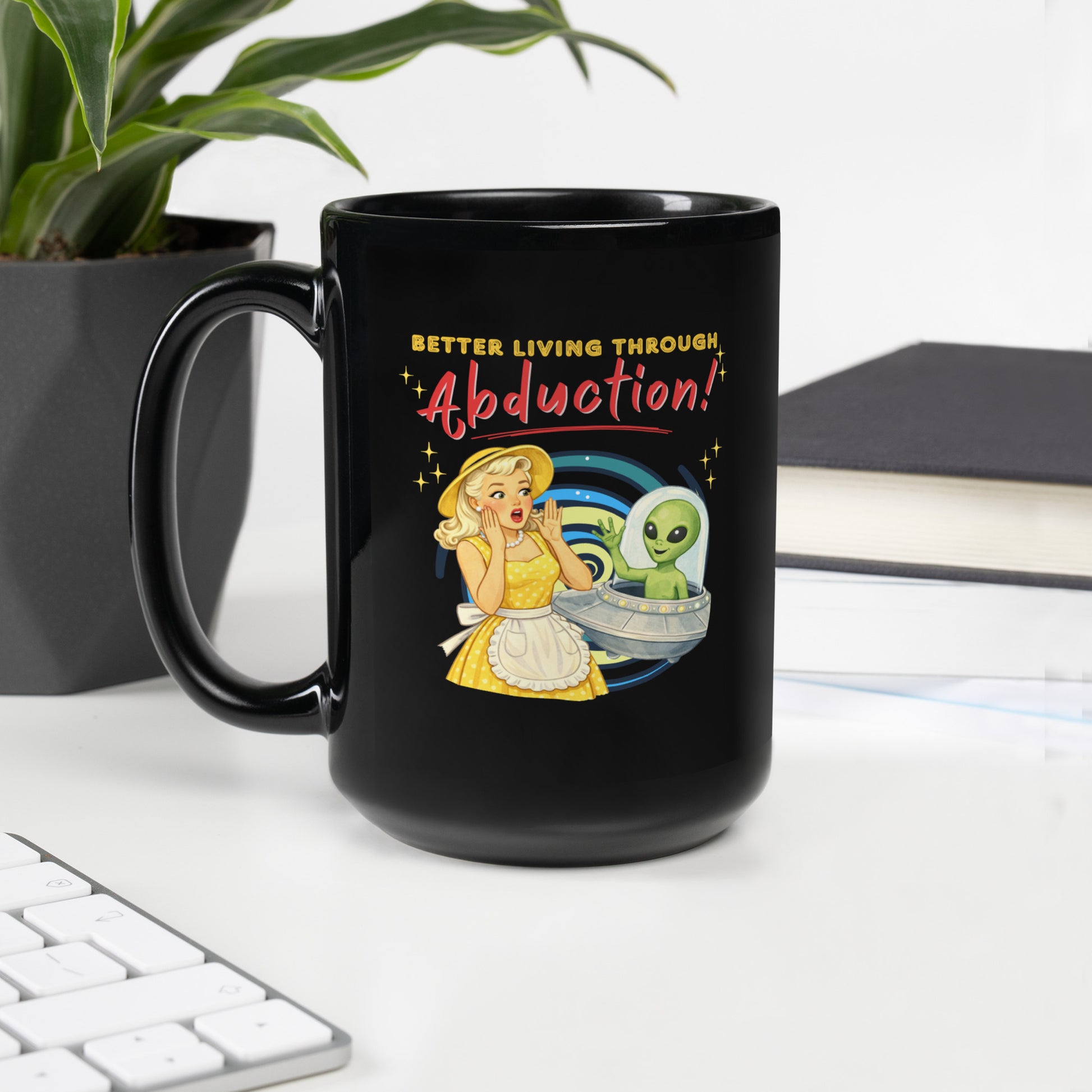 Better Living Through Abduction black ceramic mug — vintage 1950s retro blonde housewife in yellow polka dot dress reacting with delight to a friendly green alien waving from a silver saucer, printed on both sides by Cinderpoint Studios