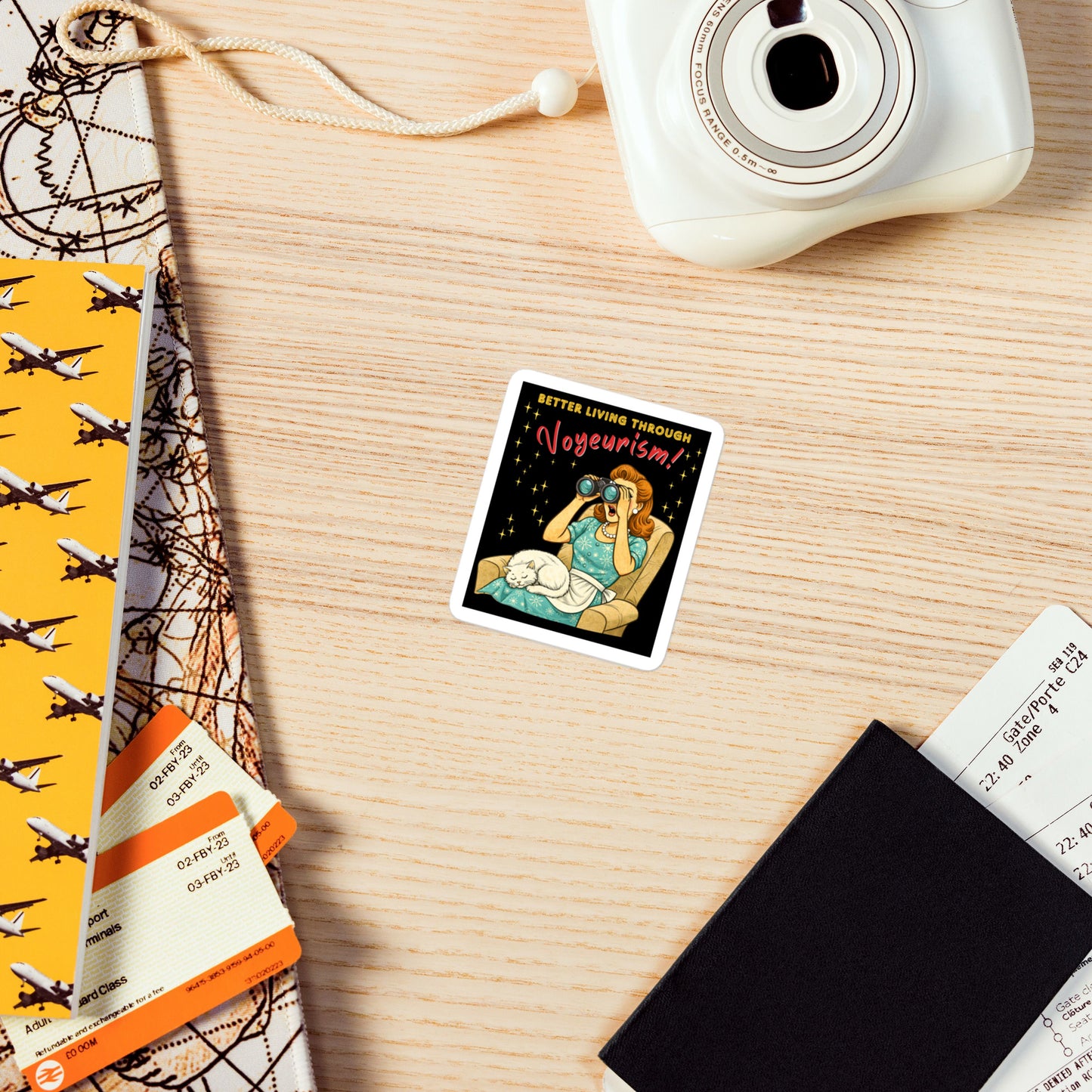Better Living Through Voyeurism vinyl decal — vintage 1950s retro housewife peering through binoculars with mouth open while white cat sleeps in her lap on black background, satin finish waterproof sticker by Cinderpoint Studios