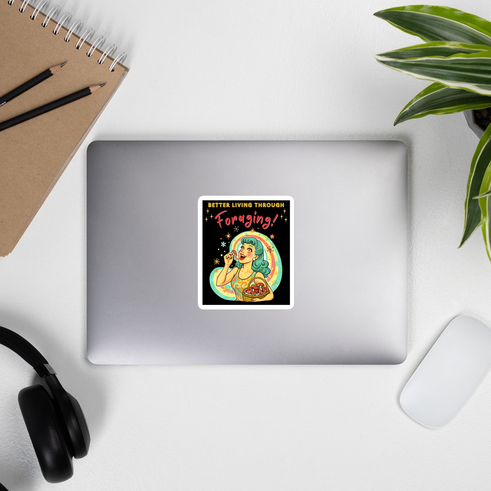 Better Living Through Foraging vinyl decal — vintage retro housewife with teal hair and glowing eyes holding a red mushroom with basket of foraged mushrooms against rainbow halo on black background, satin finish waterproof sticker by Cinderpoint Studios