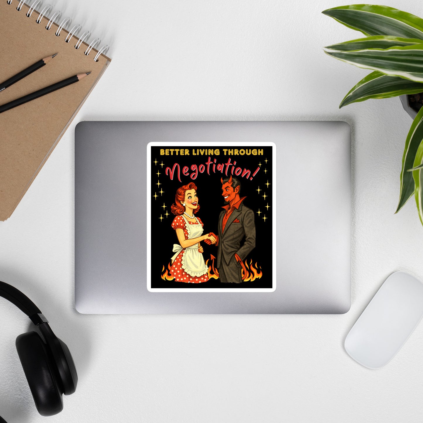 Better Living Through Negotiation vinyl decal — vintage 1950s retro housewife in polka dot apron confidently shaking hands with a suited Devil amid flames on black background, satin finish waterproof sticker by Cinderpoint Studios