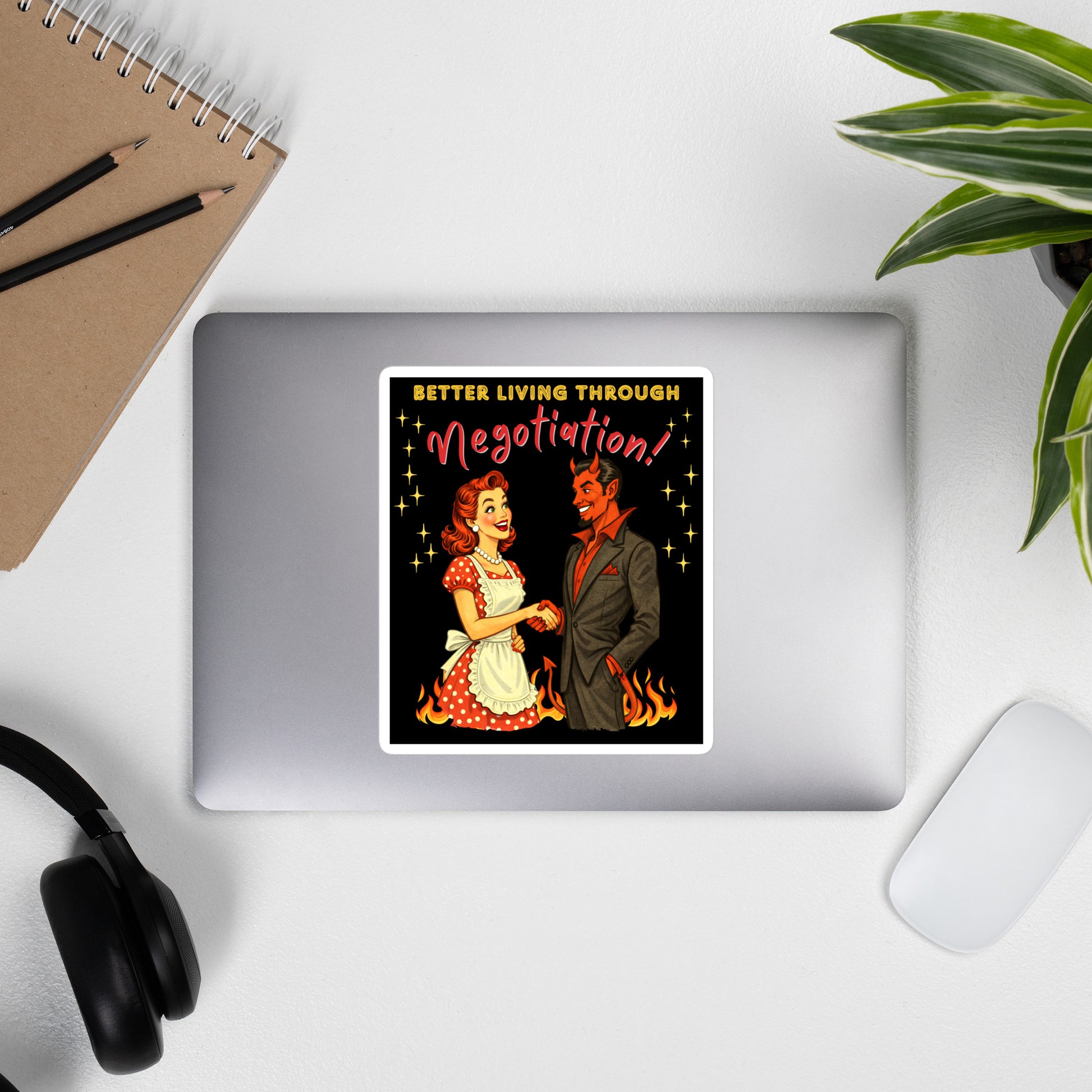 Better Living Through Negotiation vinyl decal — vintage 1950s retro housewife in polka dot apron confidently shaking hands with a suited Devil amid flames on black background, satin finish waterproof sticker by Cinderpoint Studios