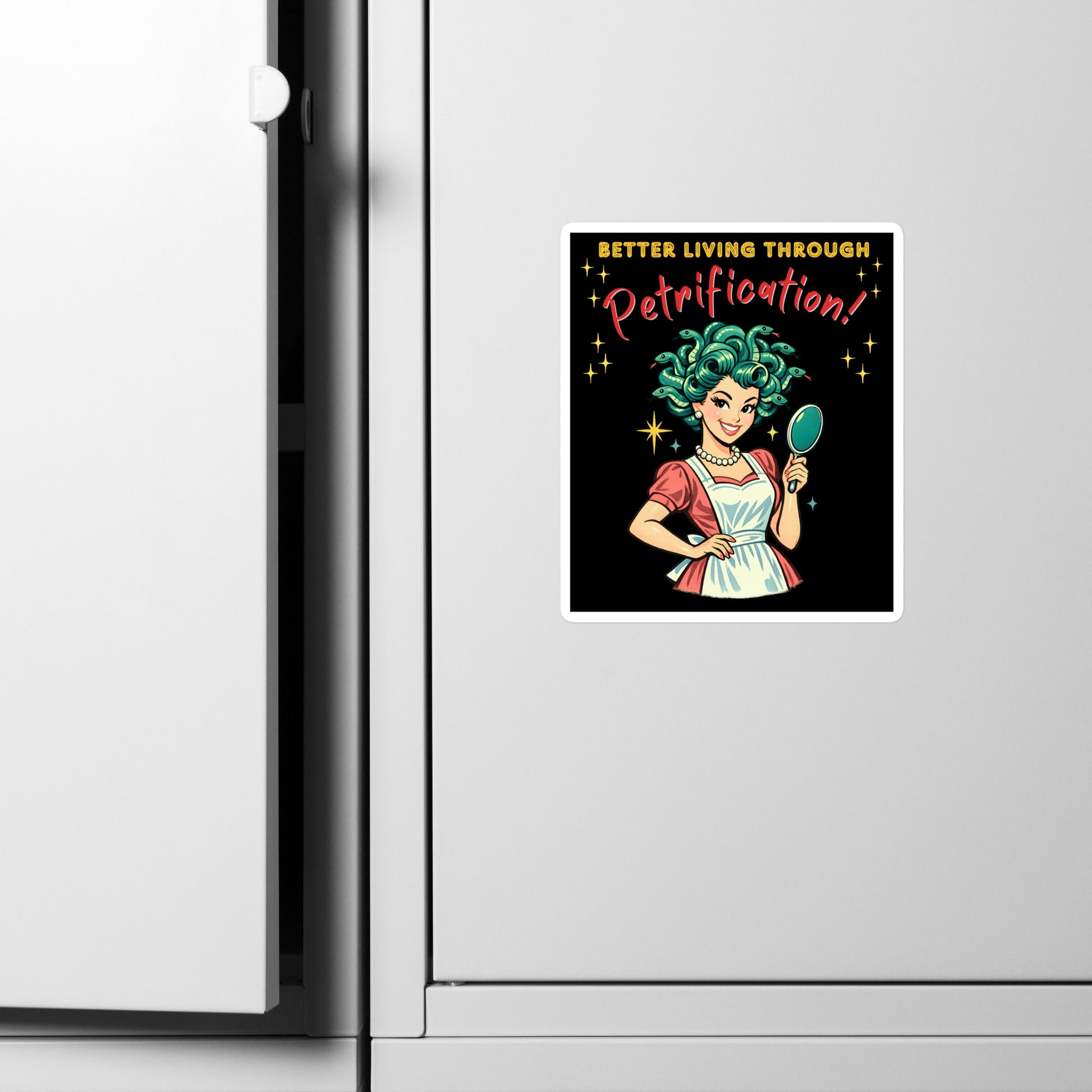 Better Living Through Petrification vinyl decal — vintage 1950s retro Medusa housewife with styled snake hair holding a hand mirror and smiling confidently in pearls and apron on black background, satin finish waterproof sticker by Cinderpoint Studios
