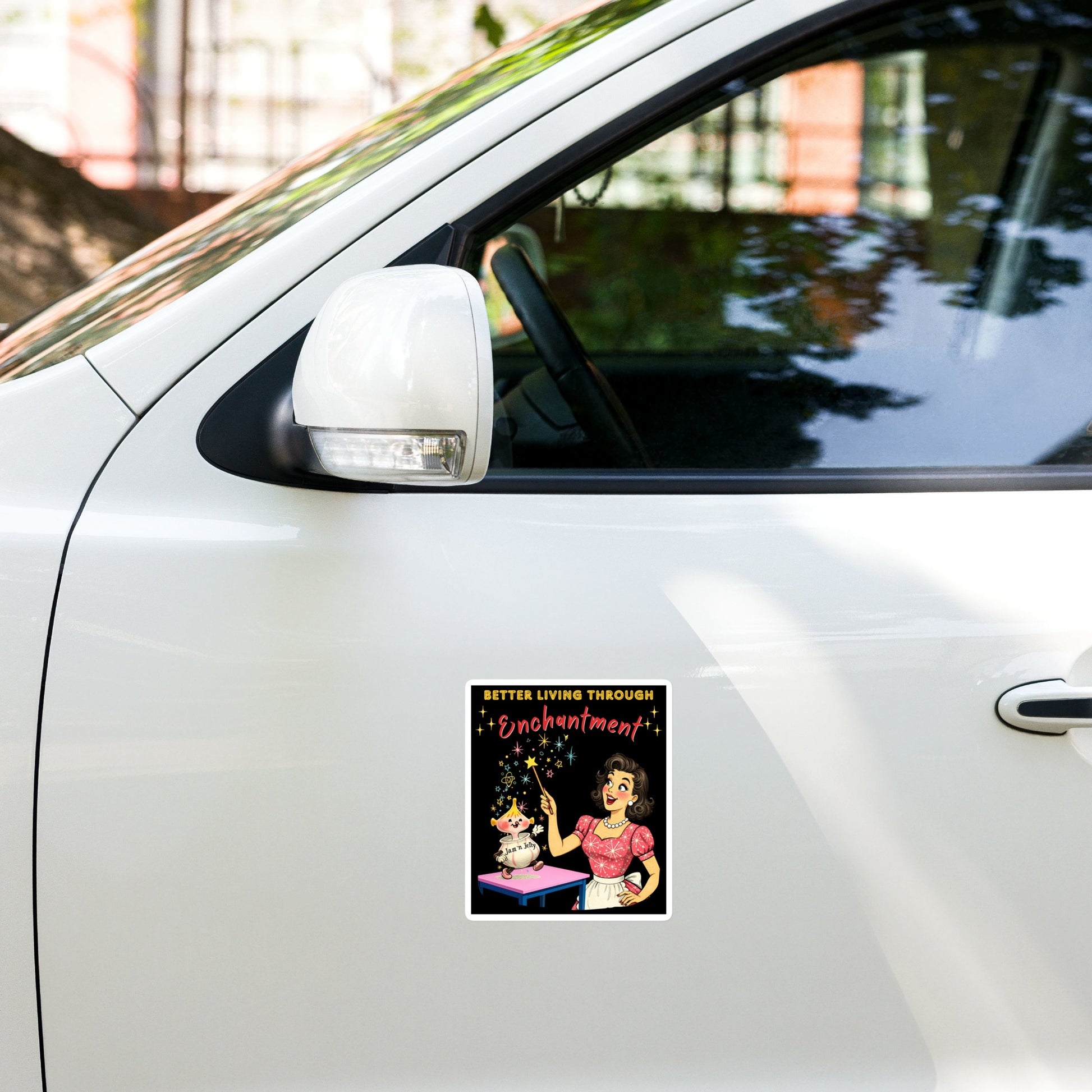 Better Living Through Enchantment vinyl decal — vintage 1950s retro housewife in atomic snowflake dress pointing a magic wand at an enchanted anthropomorphic Jam n Jelly jar dancing on a pink table on black background, satin finish waterproof sticker by Cinderpoint Studios