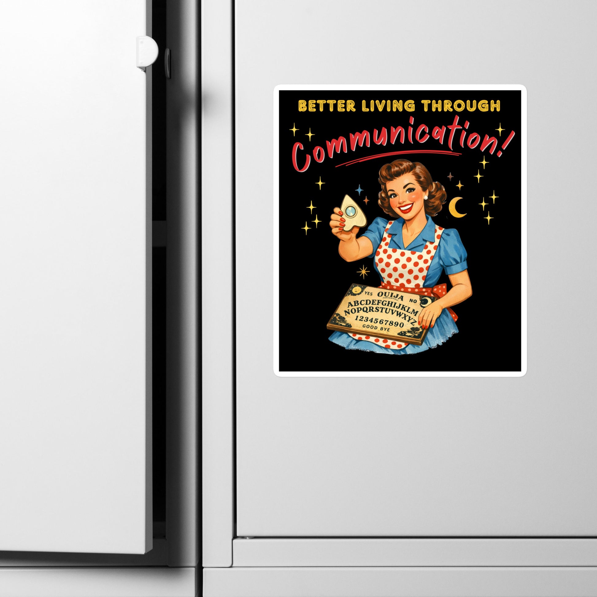 Better Living Through Communication vinyl decal on refrigerator — vintage 1950s retro housewife in polka dot apron holding ouija board and planchette on black background, satin finish waterproof sticker by Cinderpoint Studios