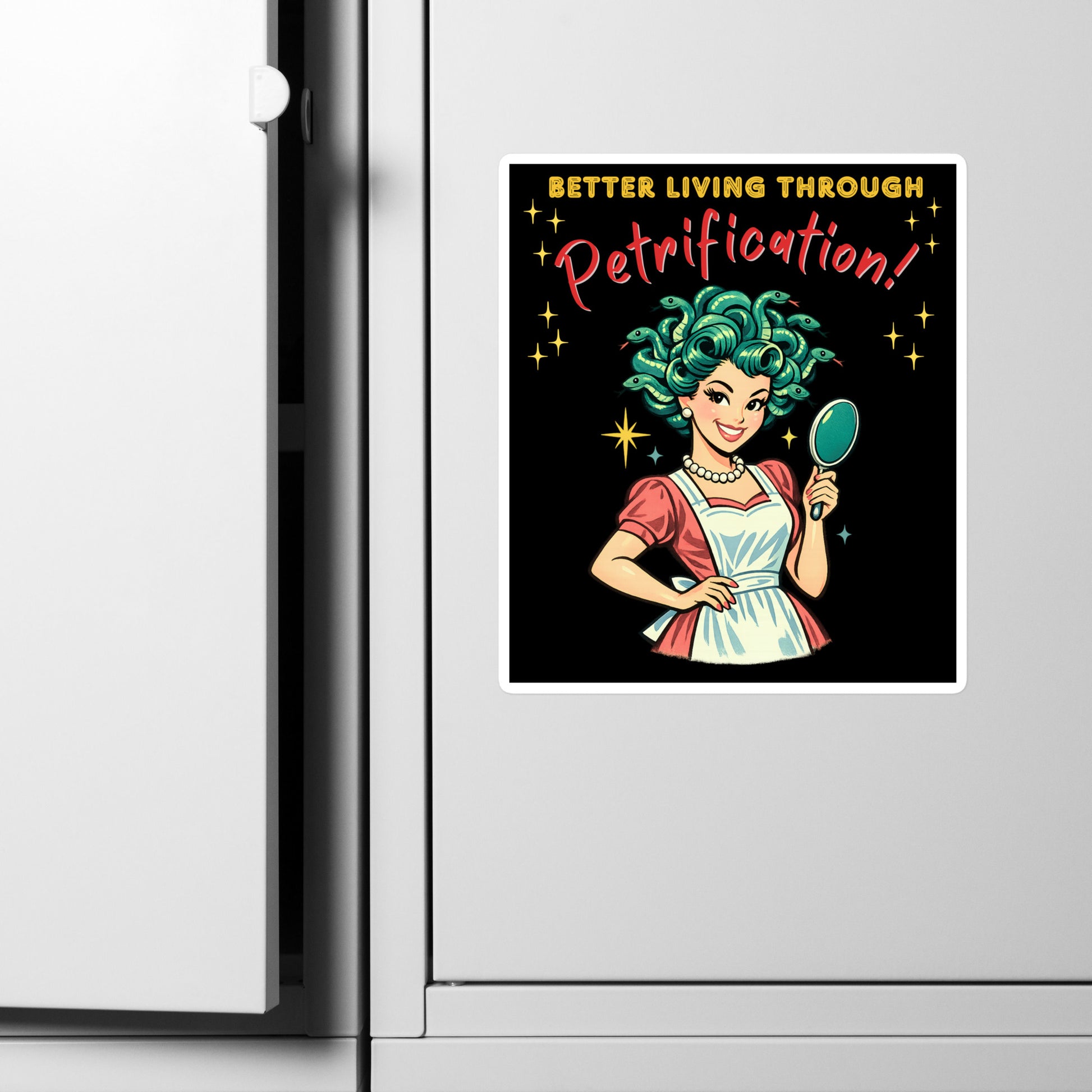 Better Living Through Petrification vinyl decal — vintage 1950s retro Medusa housewife with styled snake hair holding a hand mirror and smiling confidently in pearls and apron on black background, satin finish waterproof sticker by Cinderpoint Studios