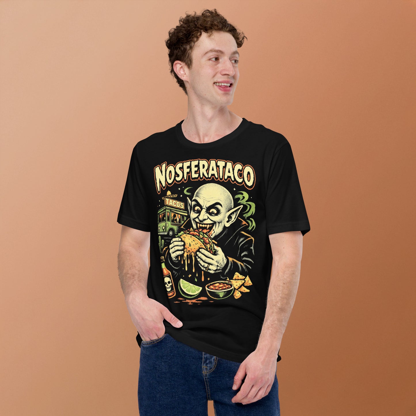 A retro horror-style graphic t-shirt featuring the vampire Nosferatu holding a taco, with "Nosferataco" in stylized, campy cinematic lettering.