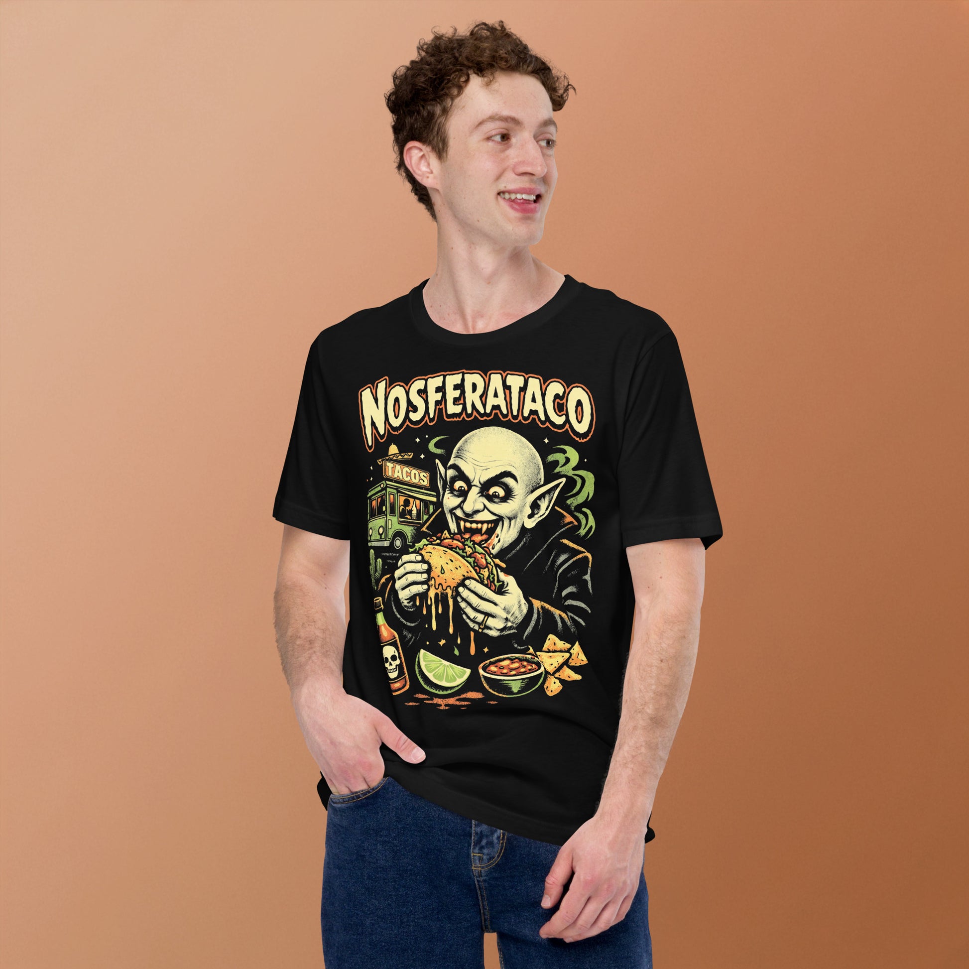 A retro horror-style graphic t-shirt featuring the vampire Nosferatu holding a taco, with "Nosferataco" in stylized, campy cinematic lettering.