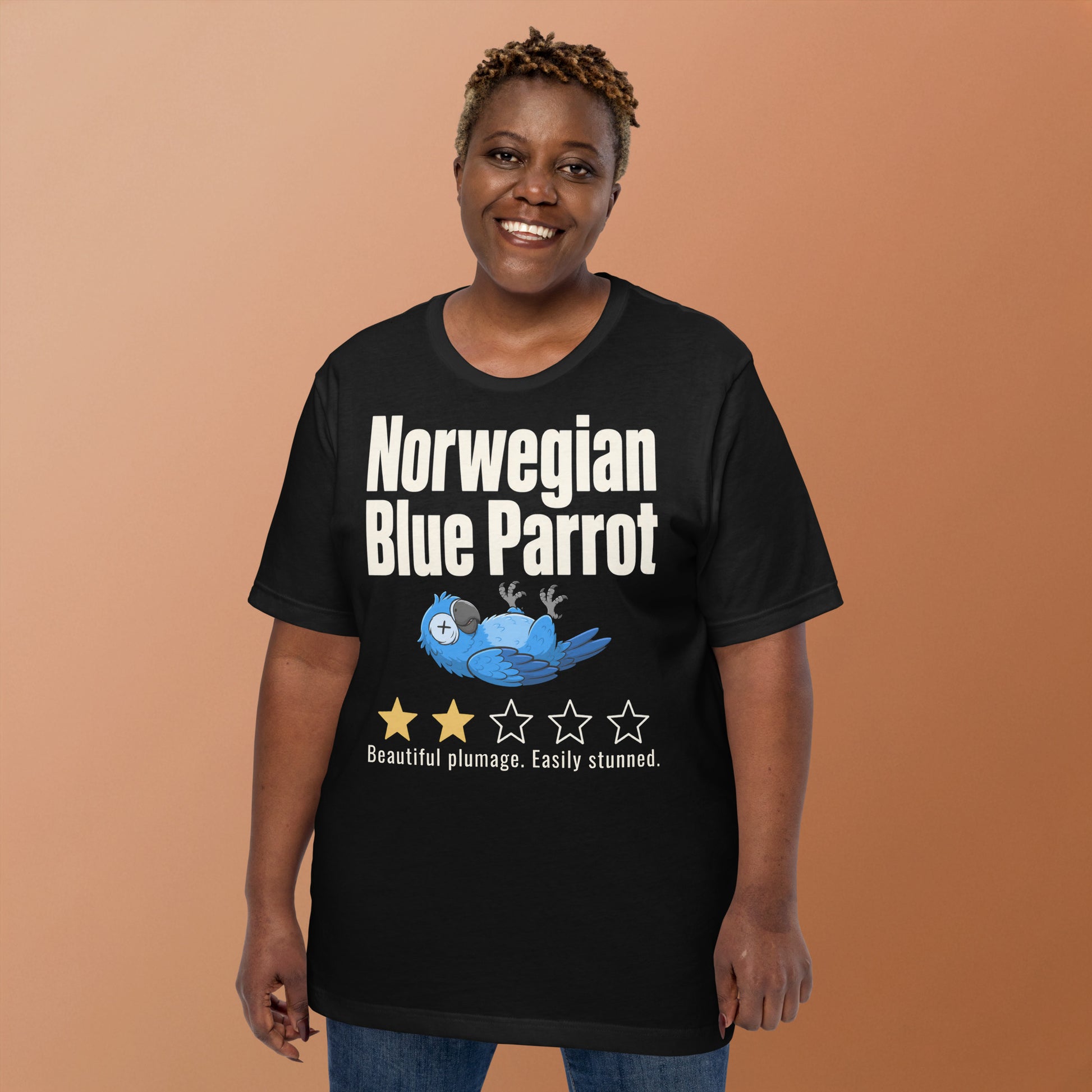 Funny blue parrot t-shirt design with two-star review text reading Beautiful plumage Easily stunned
