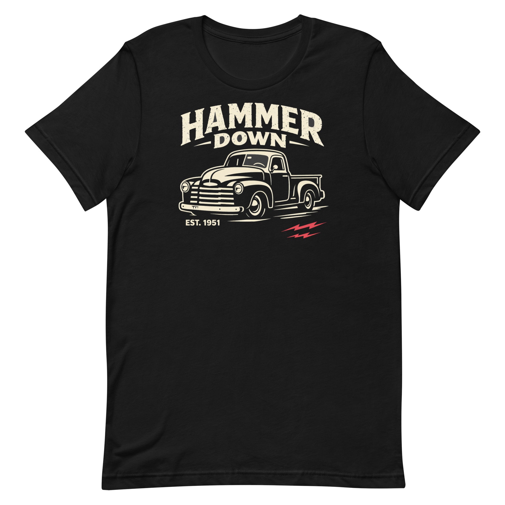 A top-down photograph of a black t-shirt featuring a distressed "Hammer Down" 1951 Chevy truck graphic.