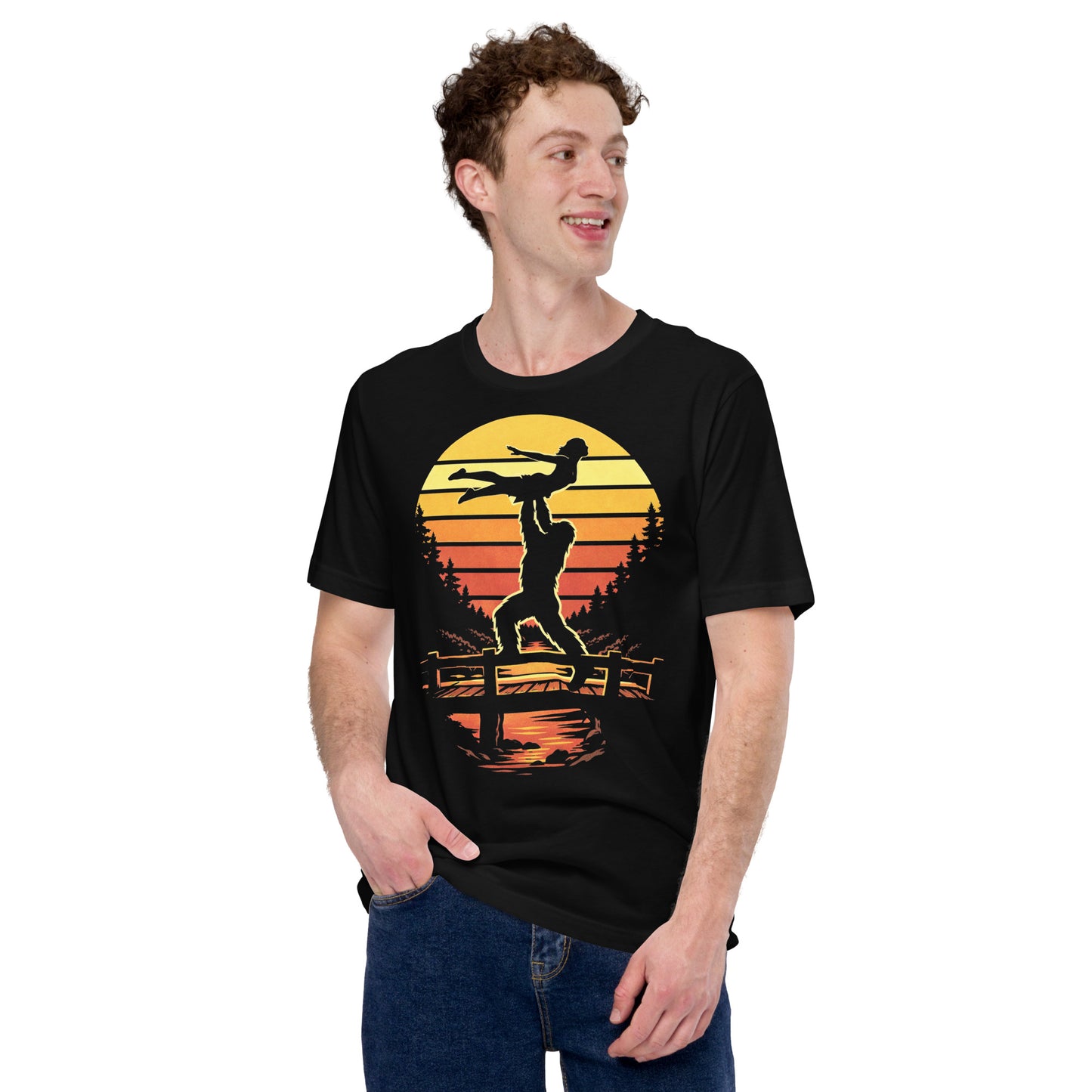 A retro-style graphic t-shirt featuring the cryptid Bigfoot performing the iconic Dirty Dancing lift pose against a vibrant, multi-colored 80s sunburst background.