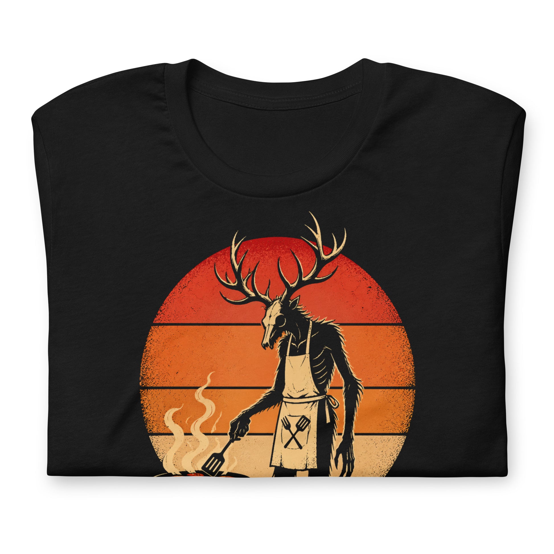 A retro-style graphic t-shirt featuring a Wendigo cryptid with antlers wearing a BBQ apron and grilling at a spatula, set against a vibrant 1980s neon sunset background.