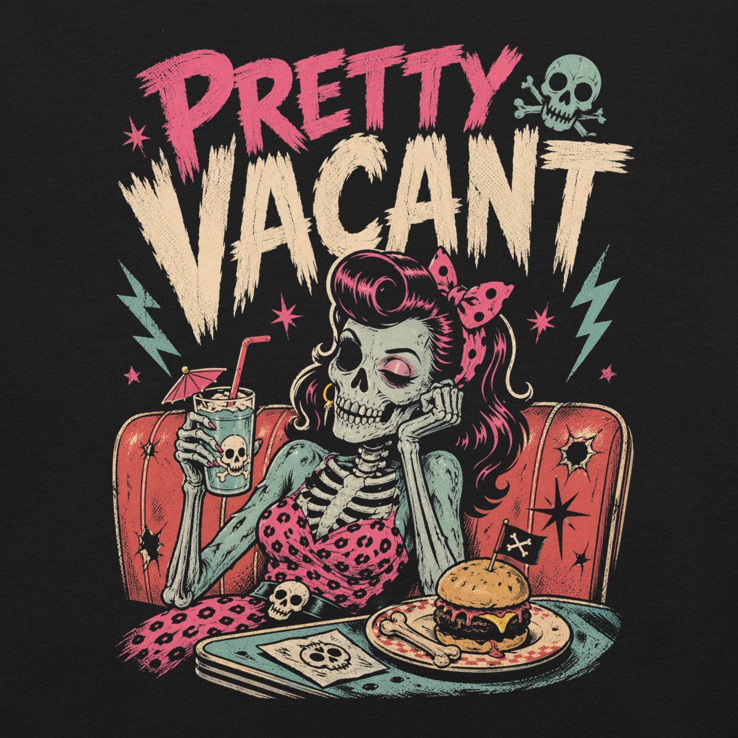 A retro-style graphic on a black t-shirt of a female skeleton pinup with pink hair in a diner booth, holding a skull-themed milkshake next to a burger with a crossbones flag.