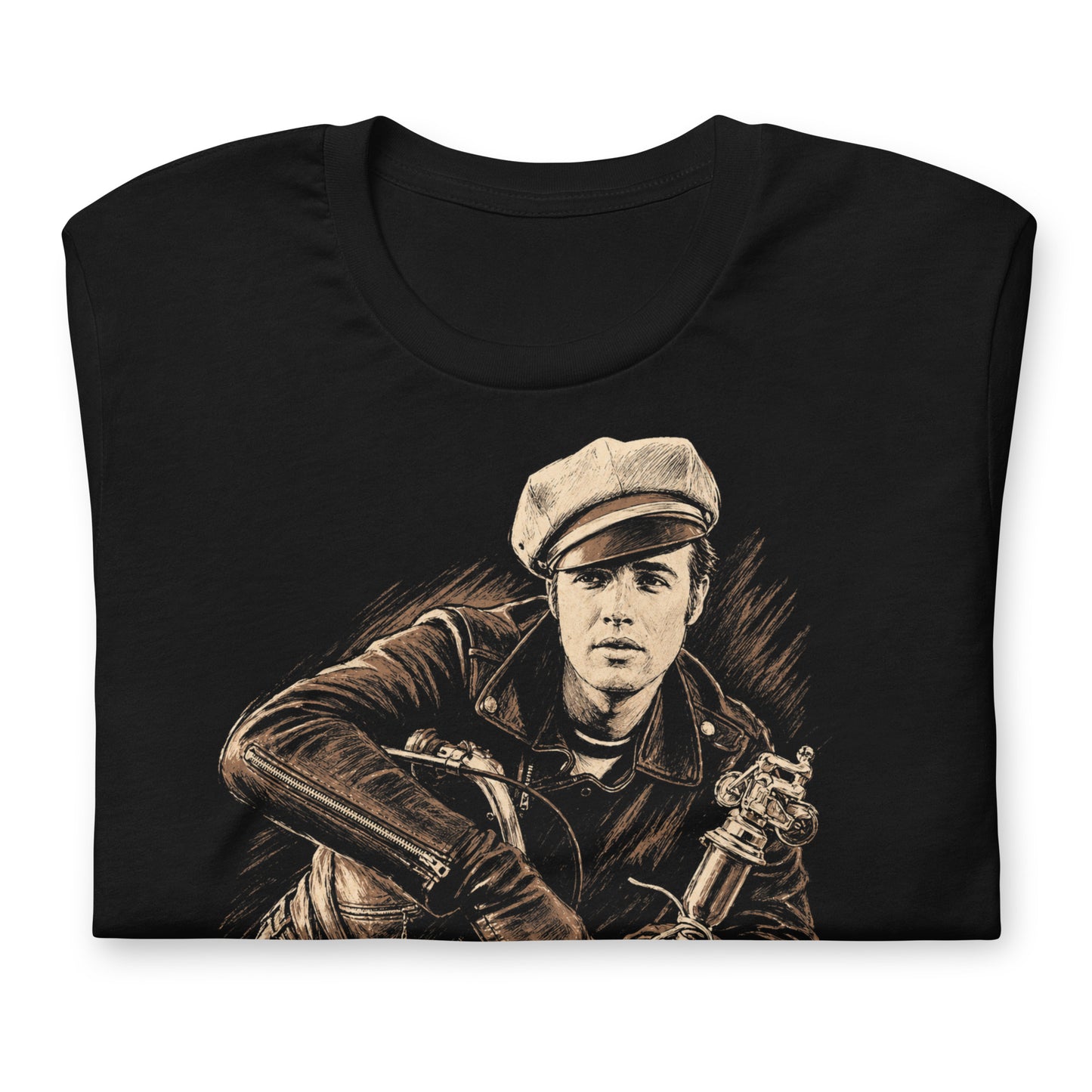 A high-contrast artistic portrait of Marlon Brando as Johnny from The Wild One on a black t-shirt, featuring his iconic tilted biker cap and leather jacket.