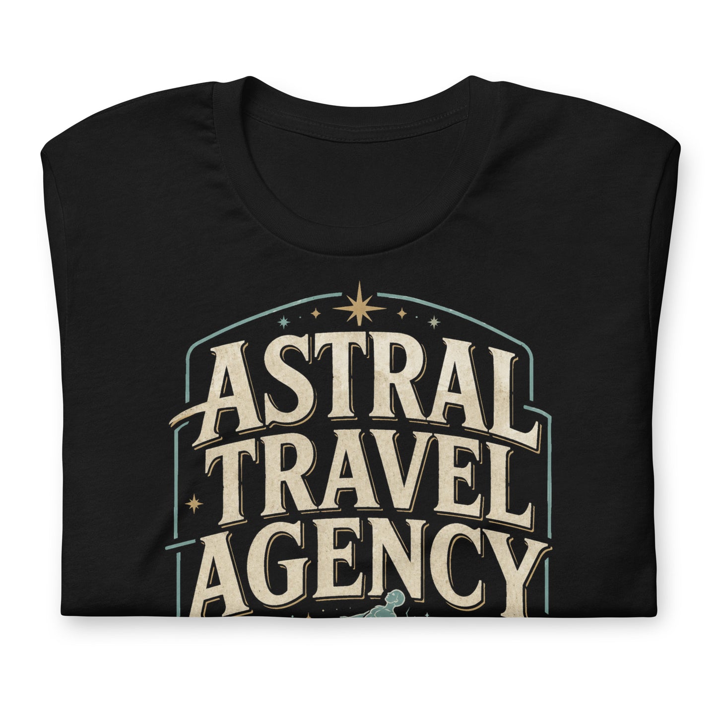 Black graphic tee featuring original Cinderpoint Studios artwork for Astral Travel Agency, a retro occult travel design with large vintage lettering, astral projection imagery, stars, and text including Official Booking Office, Akashic Tours, and Out-of-Body Excursions.