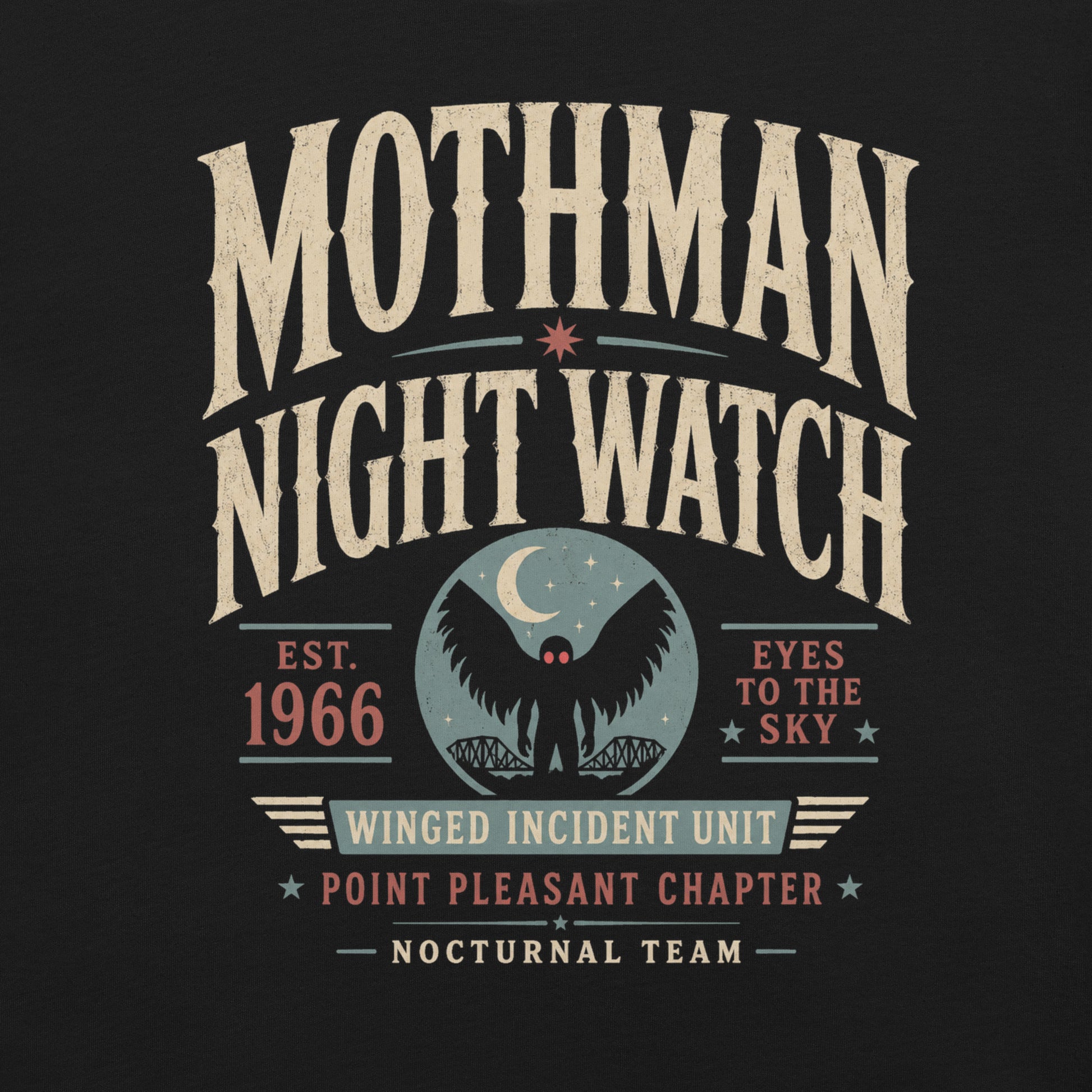 Close-up of the Mothman Night Watch original Cinderpoint Studios artwork printed on a black tee, showing distressed retro lettering, Mothman silhouette with red eyes, crescent moon, bridge scene, and Winged Incident Unit text.