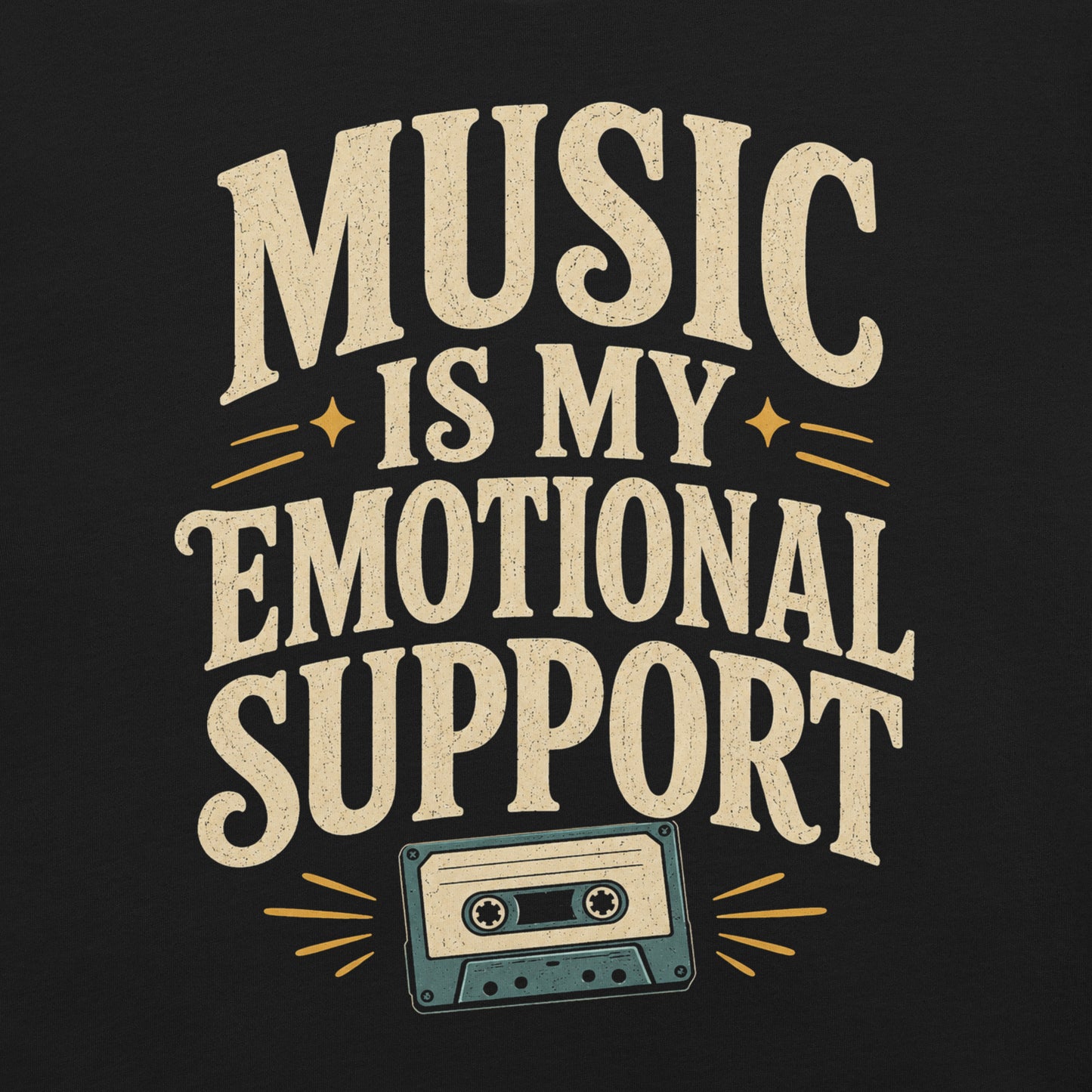 Close up of a graphic tee featuring original Cinderpoint Studios artwork for Music Is My Emotional Support, a retro music lover design with bold vintage lettering, star accents, and a cassette tape illustration.