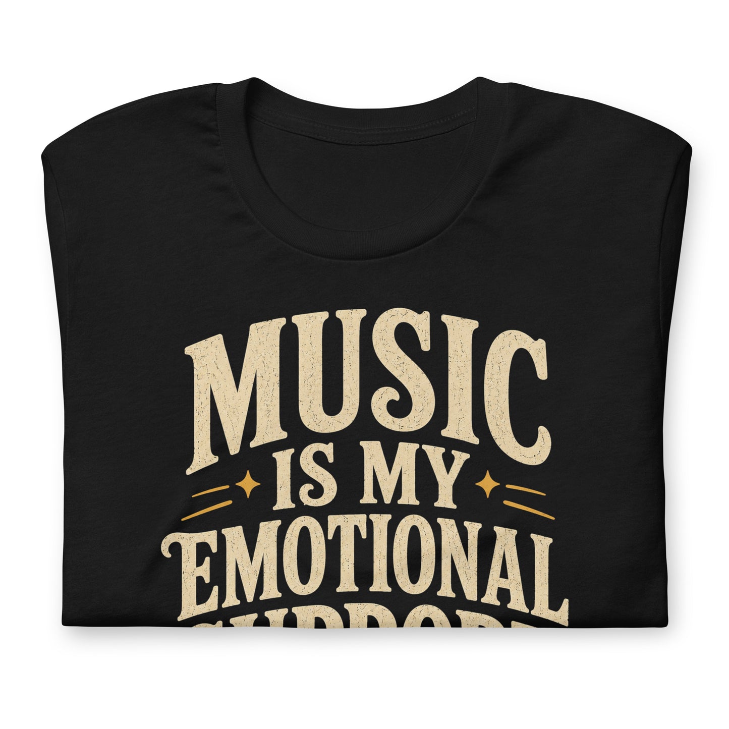 Close up of a graphic tee featuring original Cinderpoint Studios artwork for Music Is My Emotional Support, a retro music lover design with bold vintage lettering, star accents, and a cassette tape illustration.