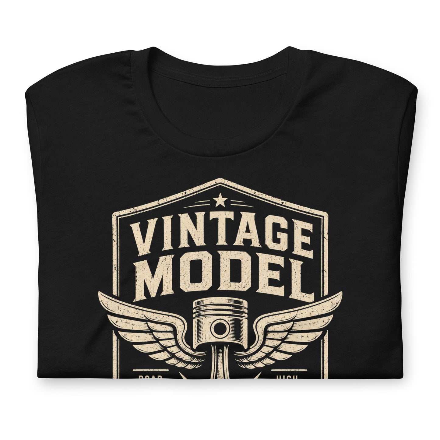 A black graphic tee featuring original Cinderpoint Studios artwork for Vintage Model, a one-color retro garage badge design with bold lettering, a winged piston, and text including Road Tested, High Mileage, Original Parts, and Classic Edition.