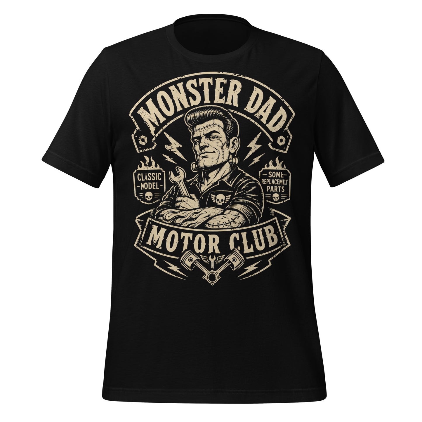 A black graphic tee featuring original Cinderpoint Studios artwork for Monster Dad Motor Club, a one-color retro garage design with a Frankenstein-inspired dad mechanic holding a wrench, lightning bolts, flames, skull details, piston accents, and text including Classic Model and Some Replacement Parts.