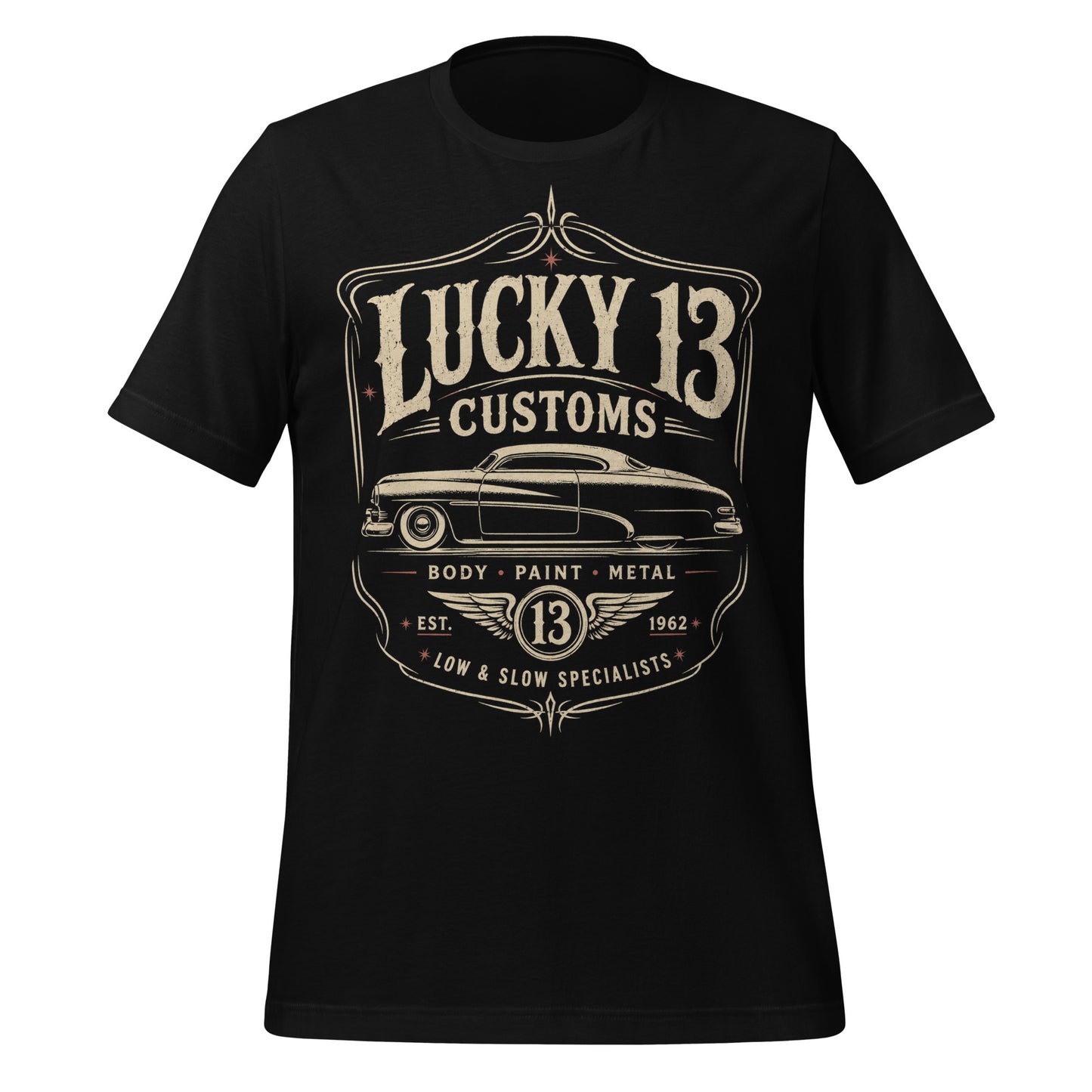 A black graphic tee featuring original Cinderpoint Studios artwork for Lucky 13 Customs, a retro custom shop design with a lowrider-style classic car, bold vintage lettering, winged 13 emblem, pinstripe-style frame, and Low & Slow Specialists text.