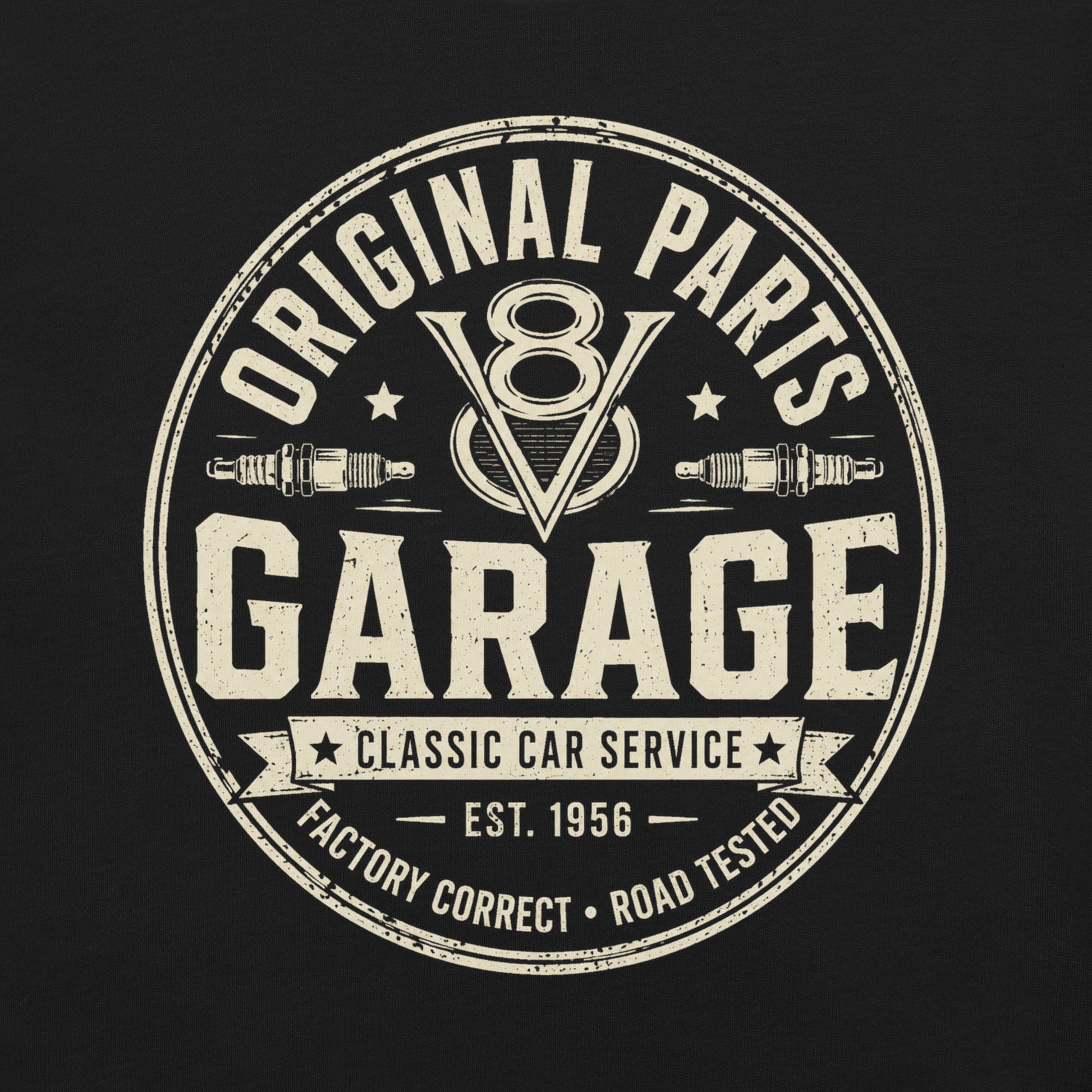 A black graphic tee featuring original Cinderpoint Studios artwork for Original Parts Garage, a one-color classic car service badge design with bold lettering, V8 emblem, spark plugs, Classic Car Service banner, Factory Correct text, and Road Tested details.