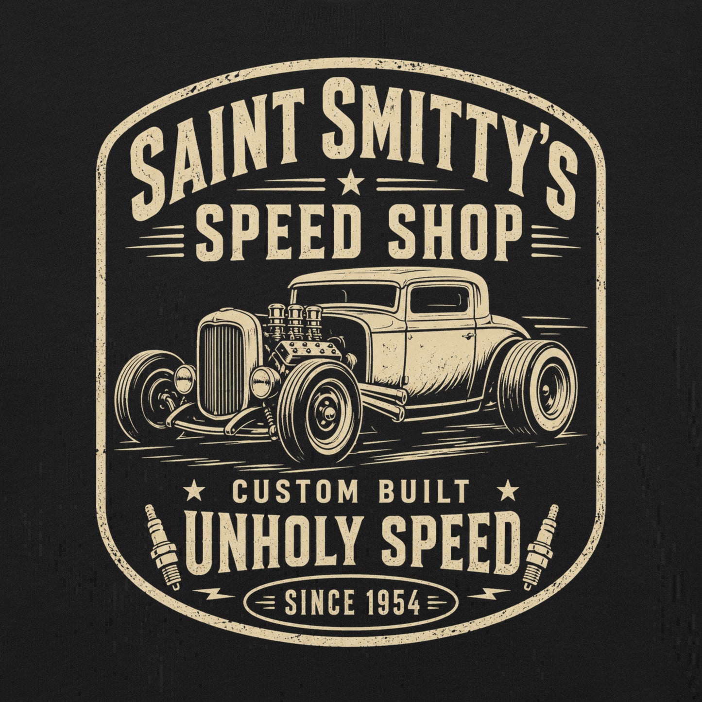 A black graphic tee featuring original Cinderpoint Studios artwork for Saint Smitty’s Speed Shop, a one-color retro hot rod garage design with vintage lettering, classic coupe artwork, spark plugs, and Custom Built Unholy Speed text.